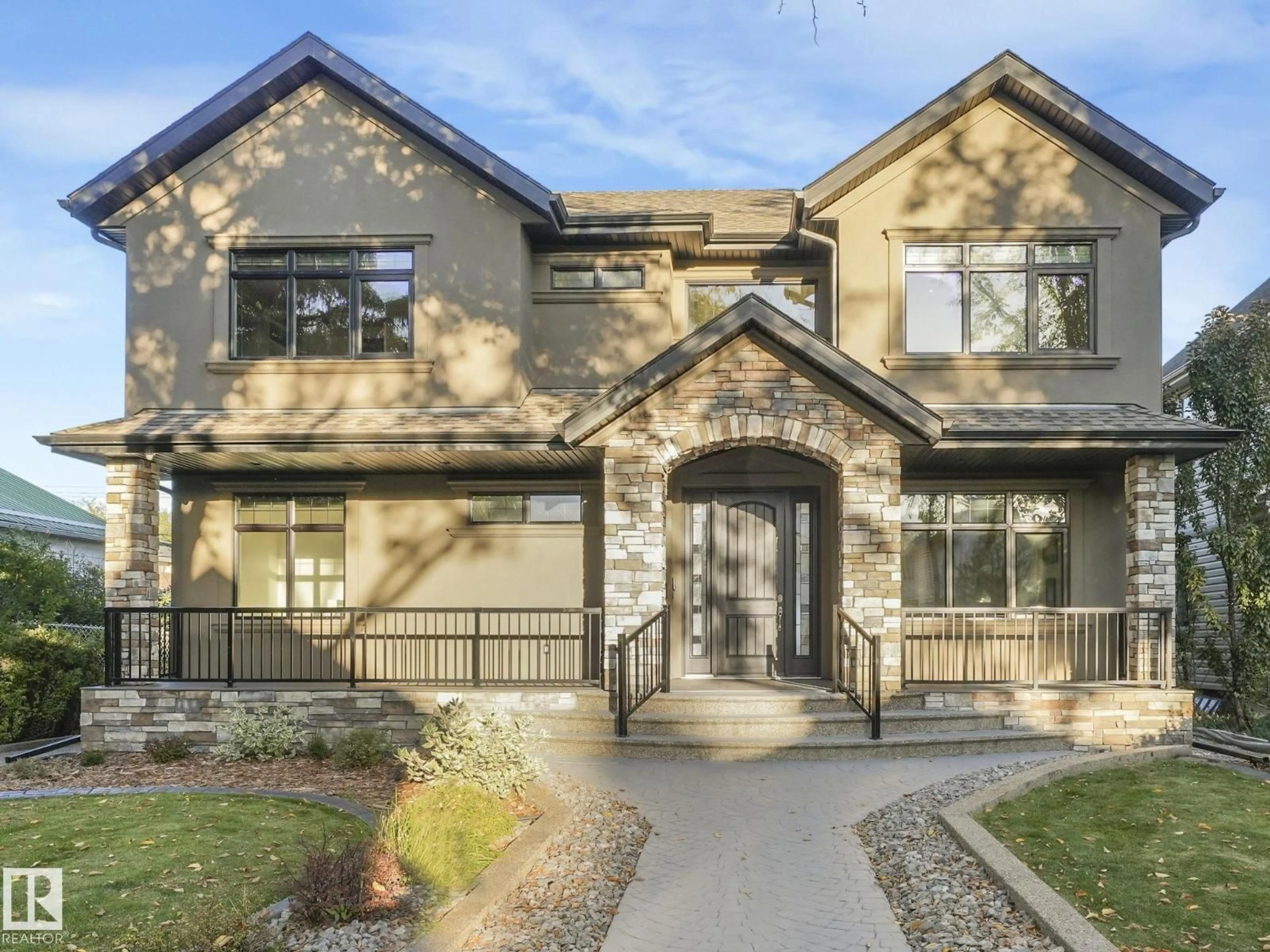 Home with brick exterior material, street for NW - 10821 128 ST, Edmonton Alberta T5M0W3