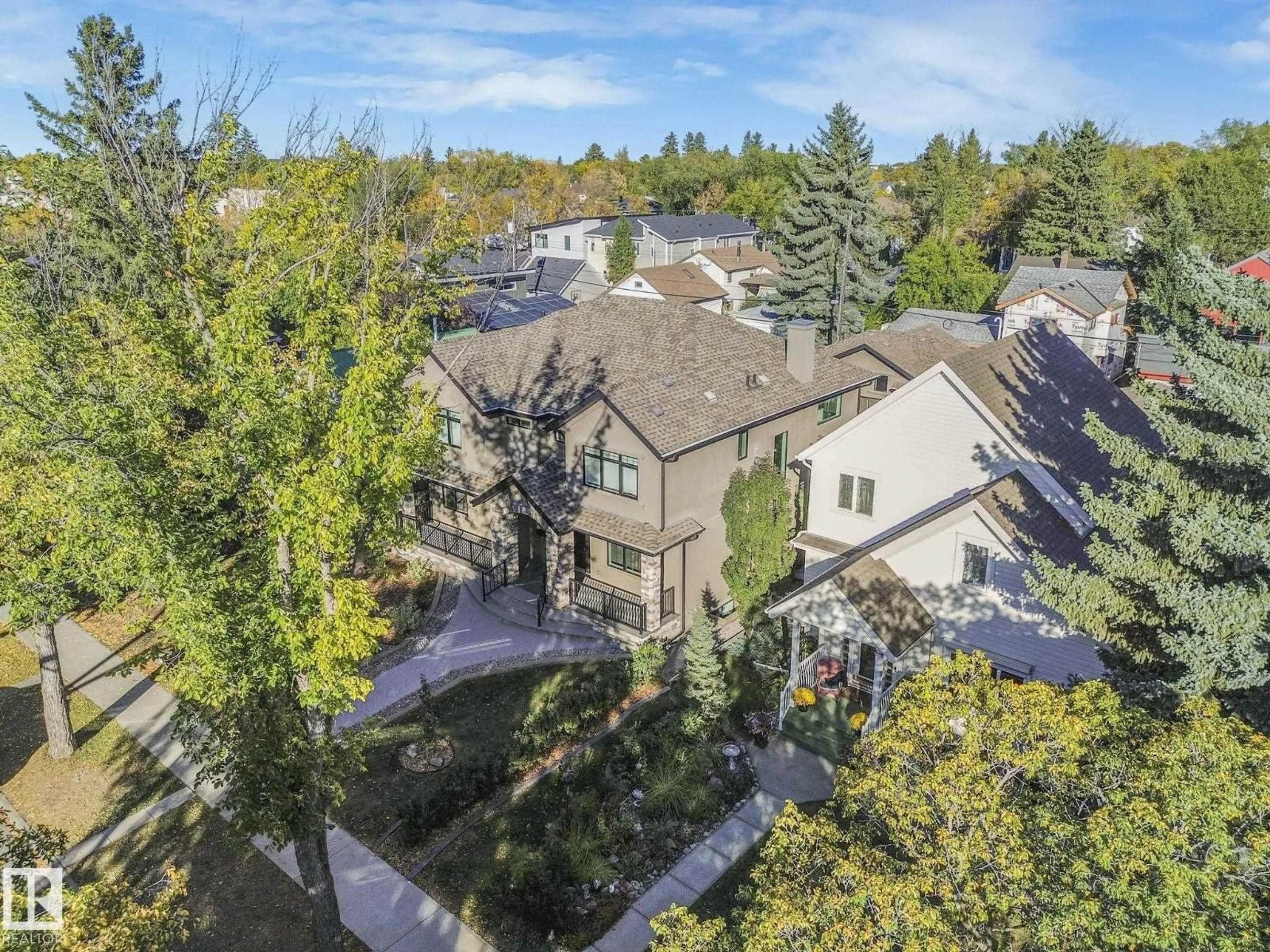 A pic from outside/outdoor area/front of a property/back of a property/a pic from drone, unknown for NW - 10821 128 ST, Edmonton Alberta T5M0W3