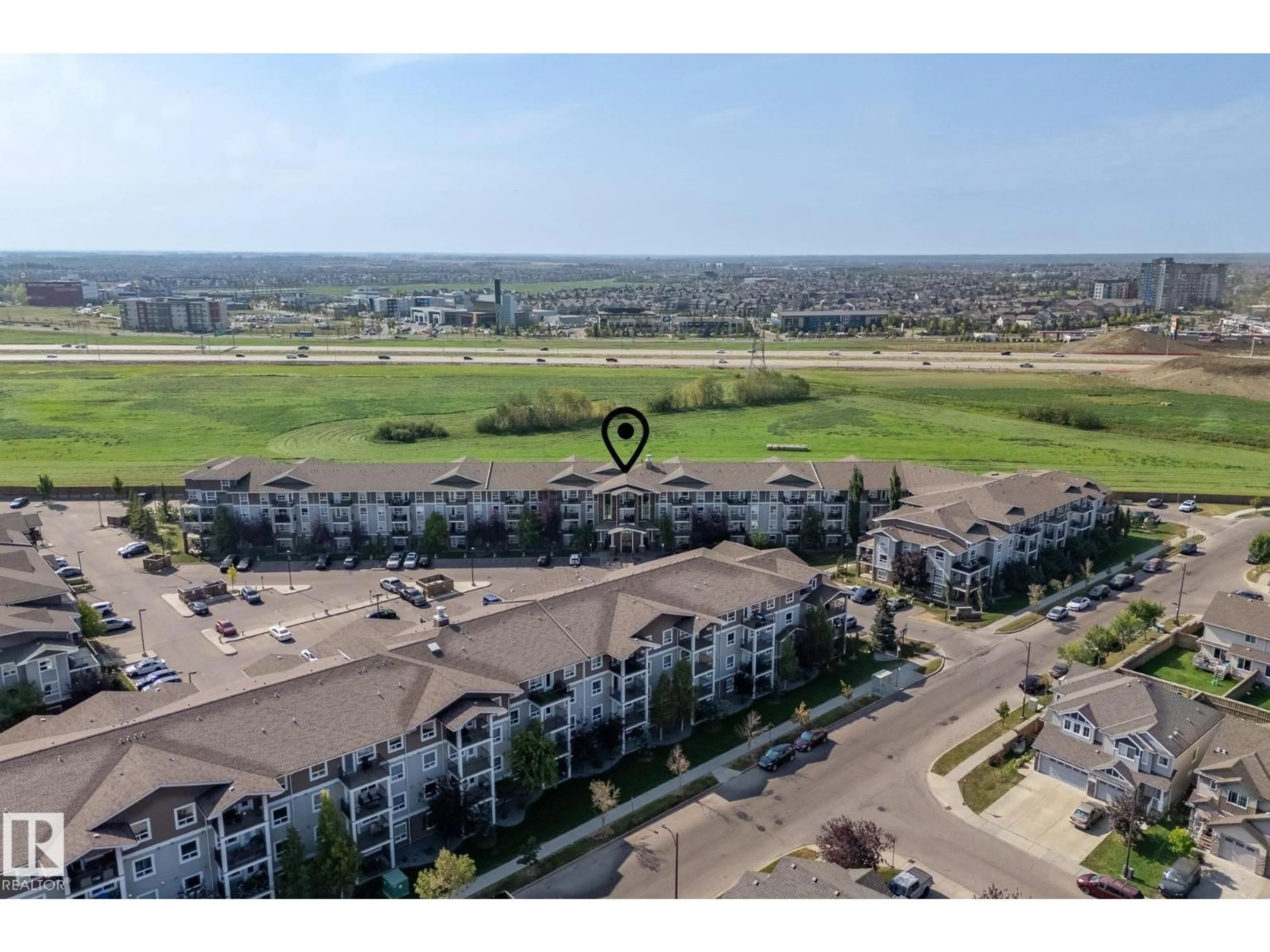 A pic from outside/outdoor area/front of a property/back of a property/a pic from drone, water/lake/river/ocean view for 9363 - 1422 SIMPSON DR, Edmonton Alberta T6R0N2