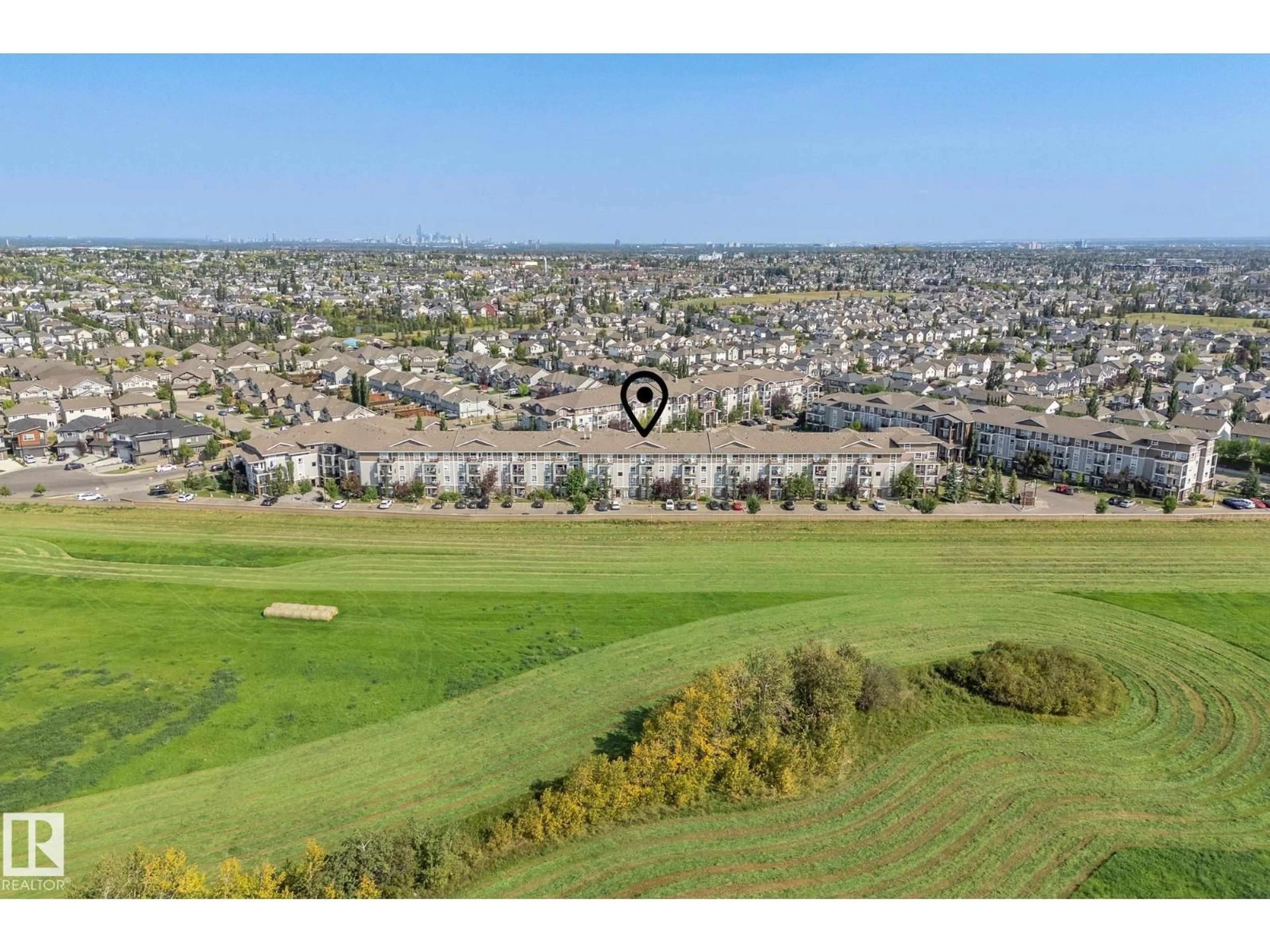 A pic from outside/outdoor area/front of a property/back of a property/a pic from drone, water/lake/river/ocean view for 9363 - 1422 SIMPSON DR, Edmonton Alberta T6R0N2