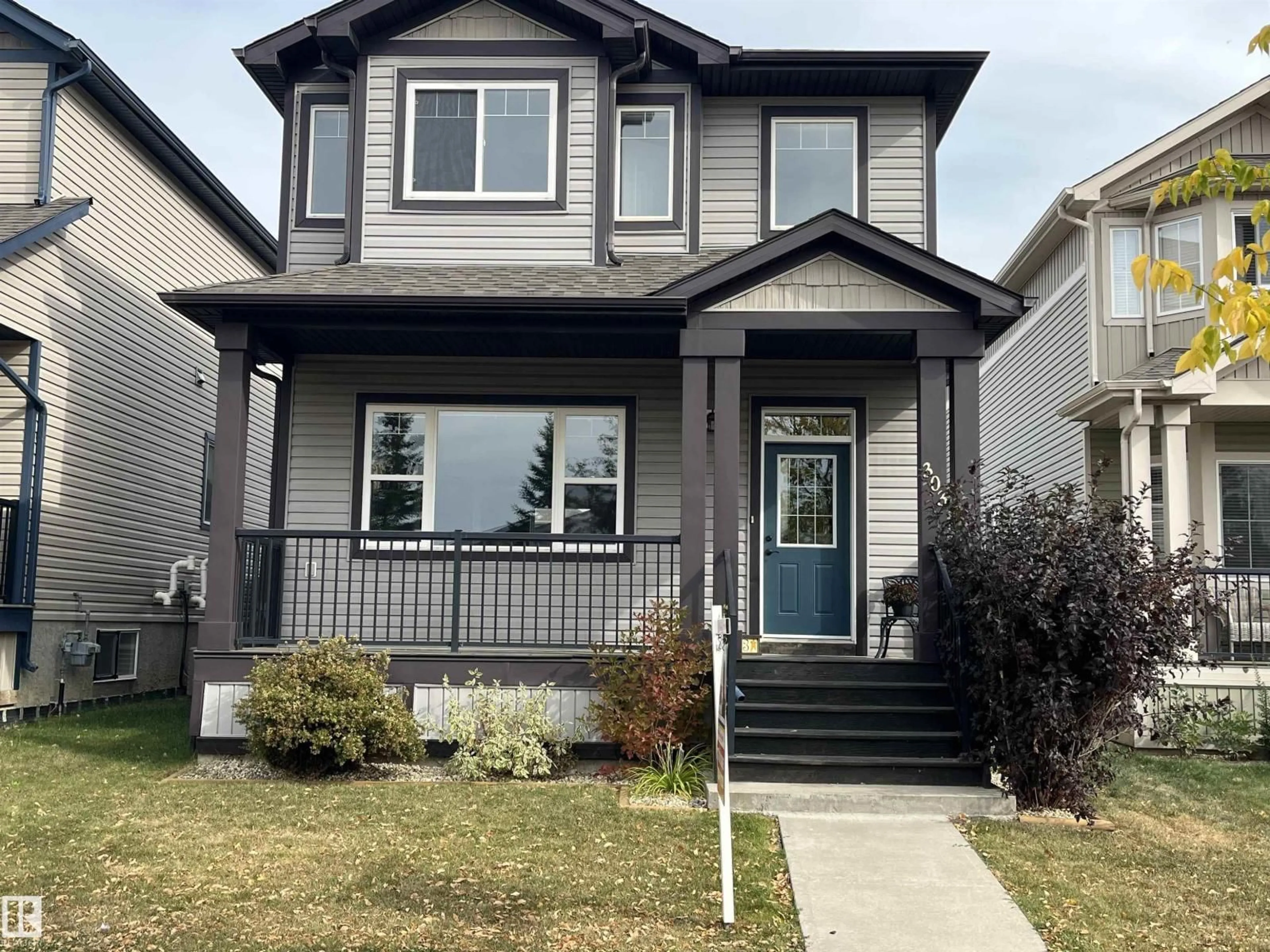 Home with vinyl exterior material, street for 303 SHERIDAN WY, Leduc Alberta T9E8R9