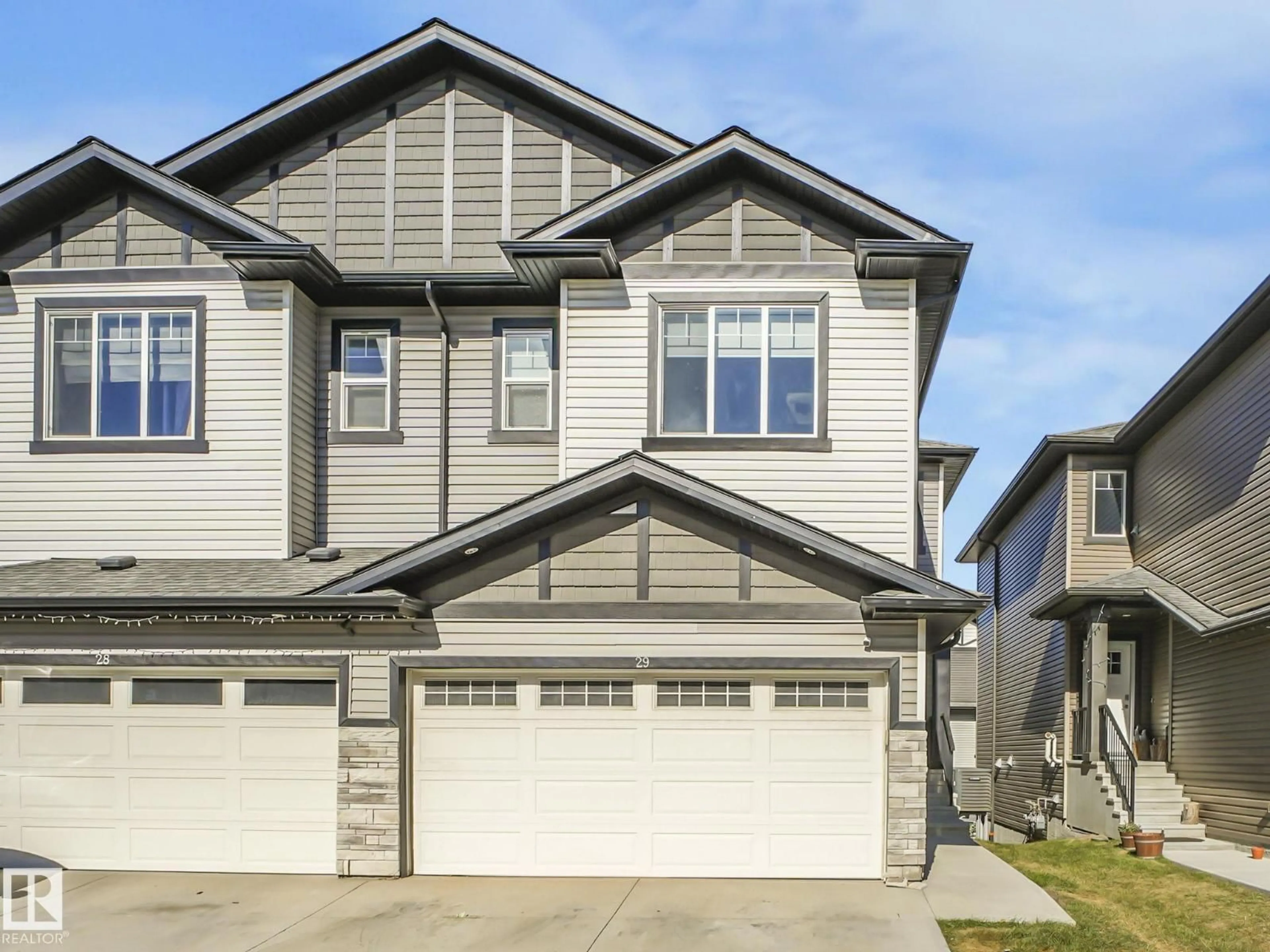Home with vinyl exterior material, street for #29 - 1703 16 AV NW, Edmonton Alberta T6T2C3