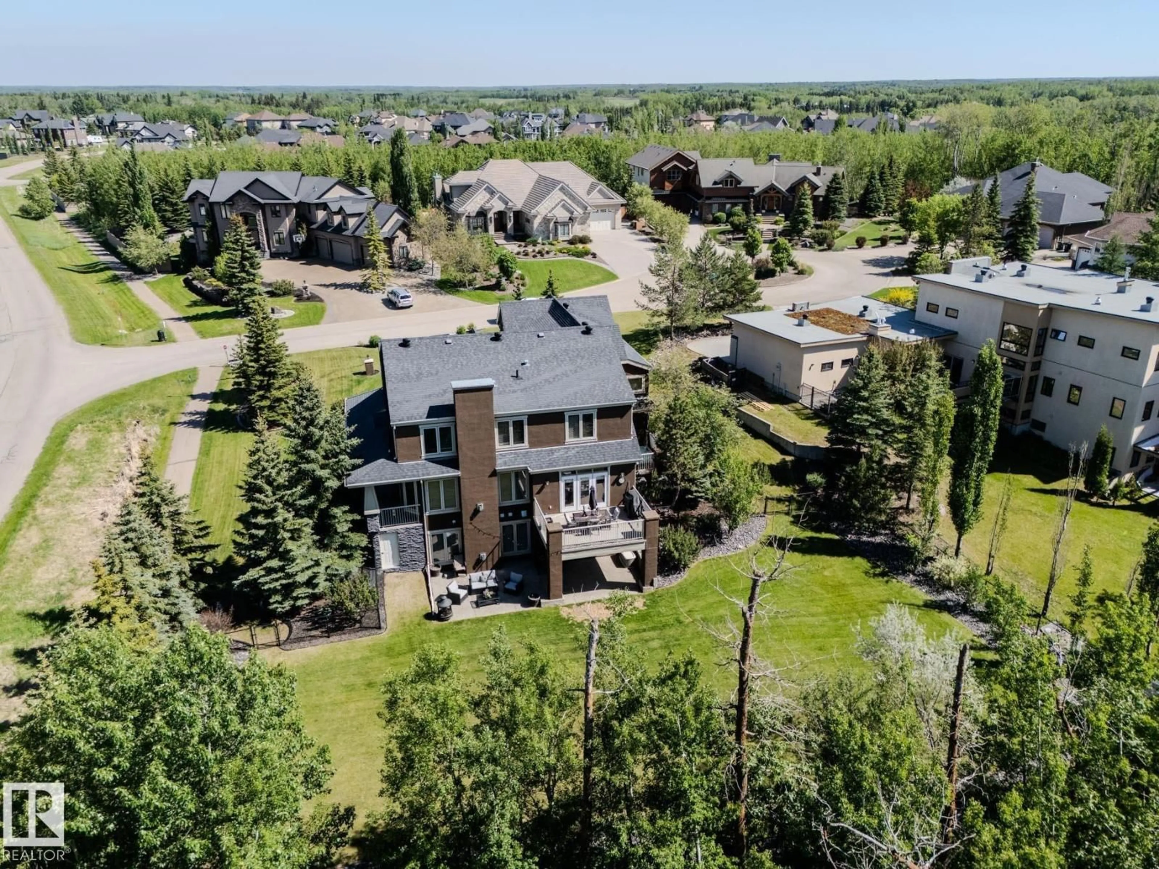 A pic from outside/outdoor area/front of a property/back of a property/a pic from drone, unknown for 23033 - 27 WYE RD, Rural Strathcona County Alberta T8B1H9