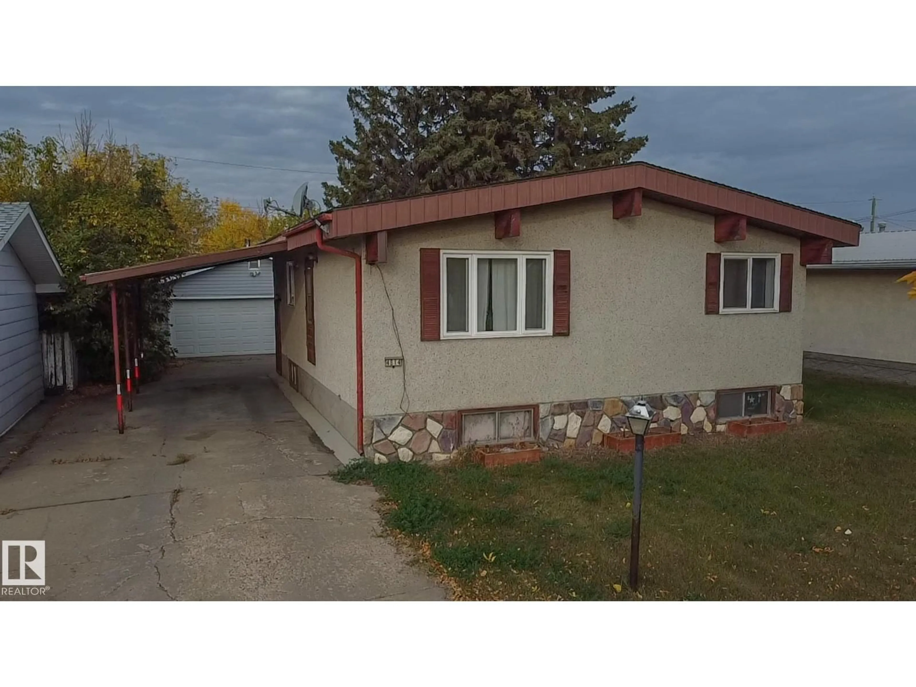 Home with vinyl exterior material, street for 4814 53 ST, Bonnyville Town Alberta T9N1X8