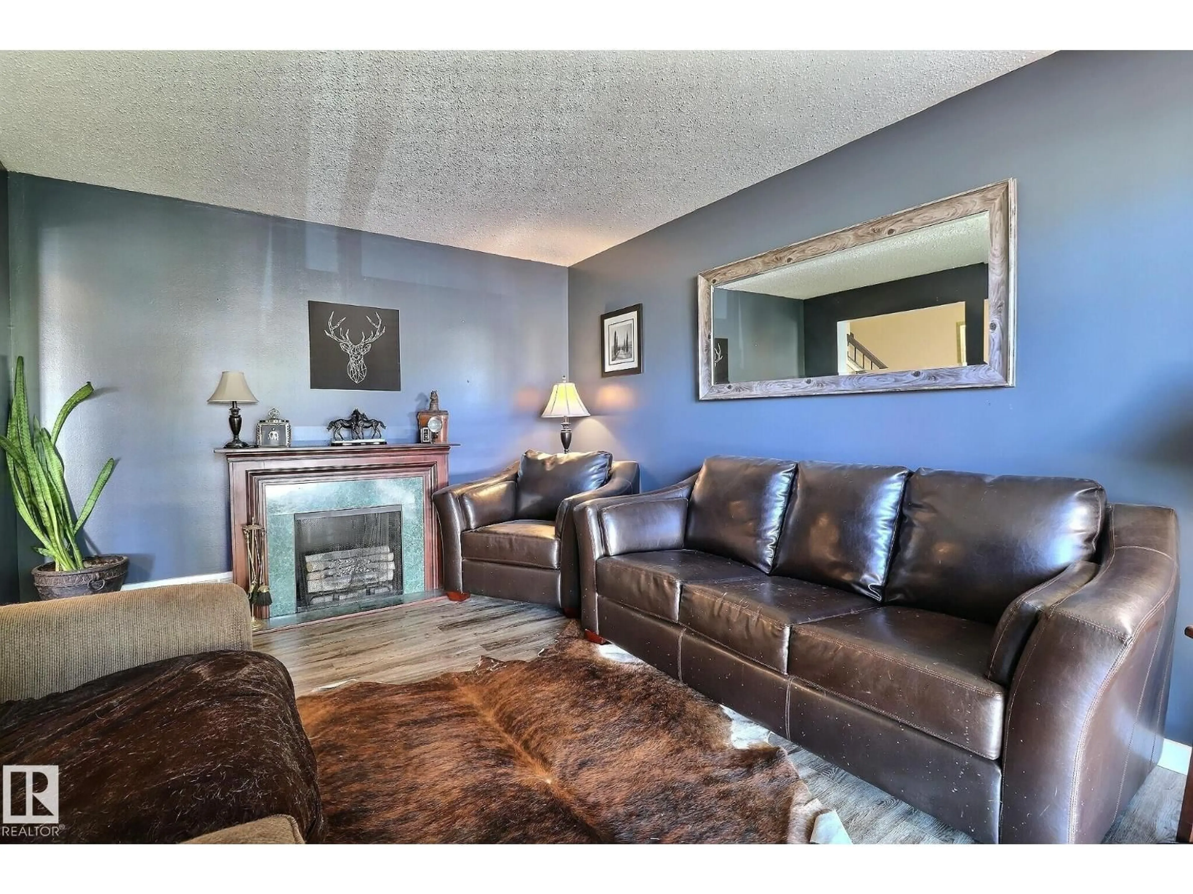 Living room with furniture, unknown for 5315 39 AV, Edmonton Alberta T6L1P3