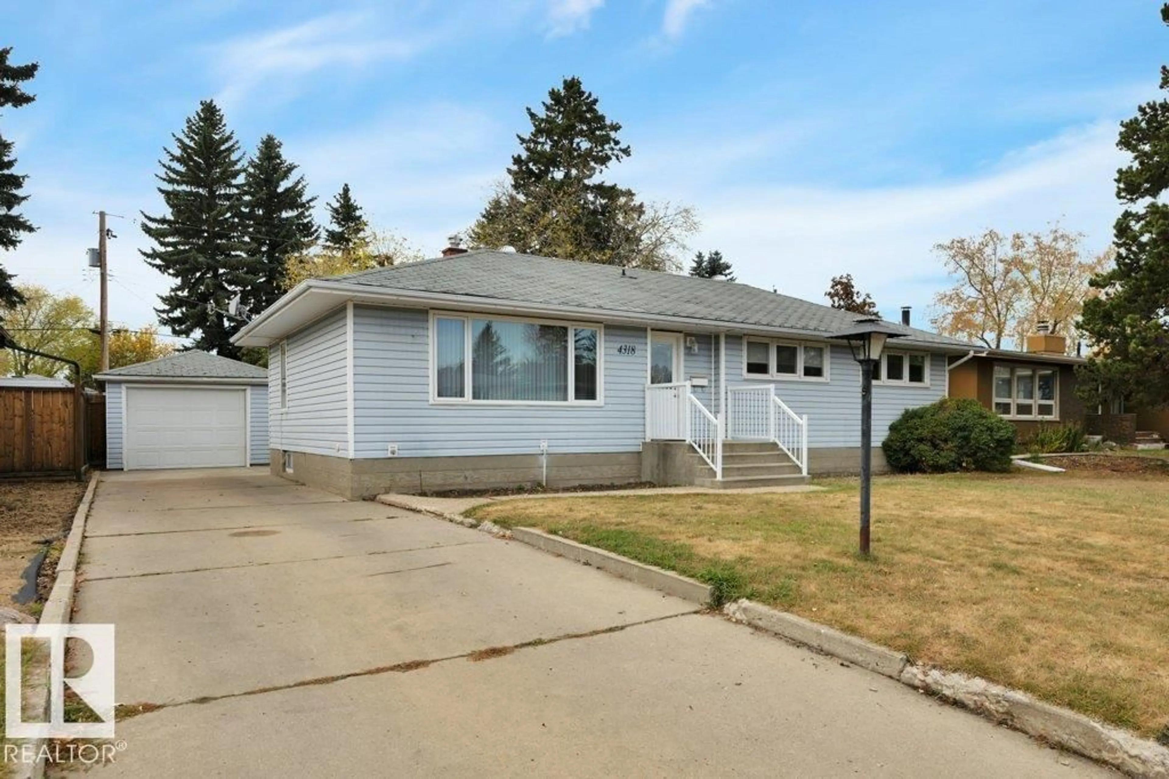 Home with vinyl exterior material, street for 4318 53A ST, Wetaskiwin Alberta T9A1S4