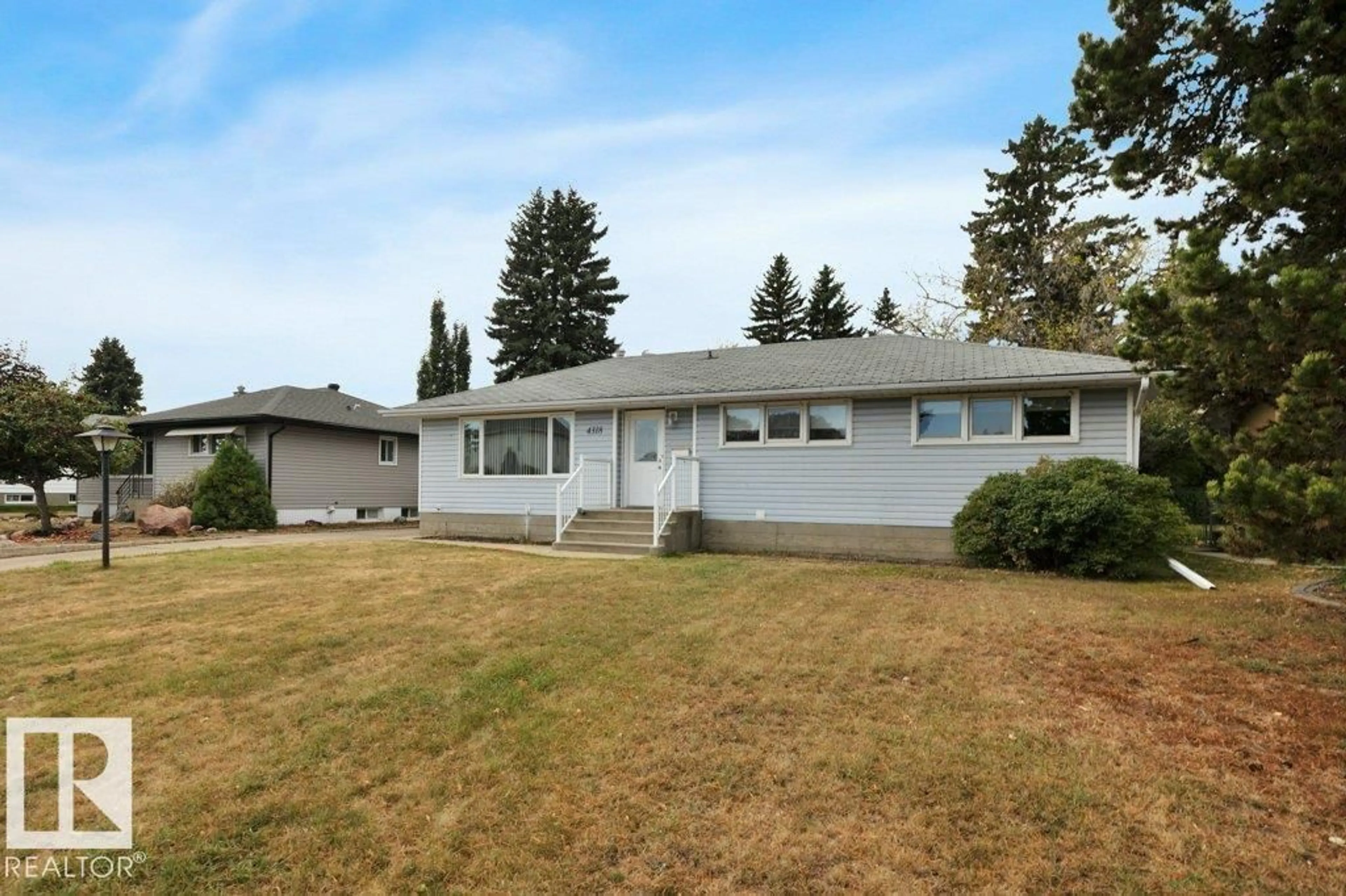 Home with vinyl exterior material, street for 4318 53A ST, Wetaskiwin Alberta T9A1S4