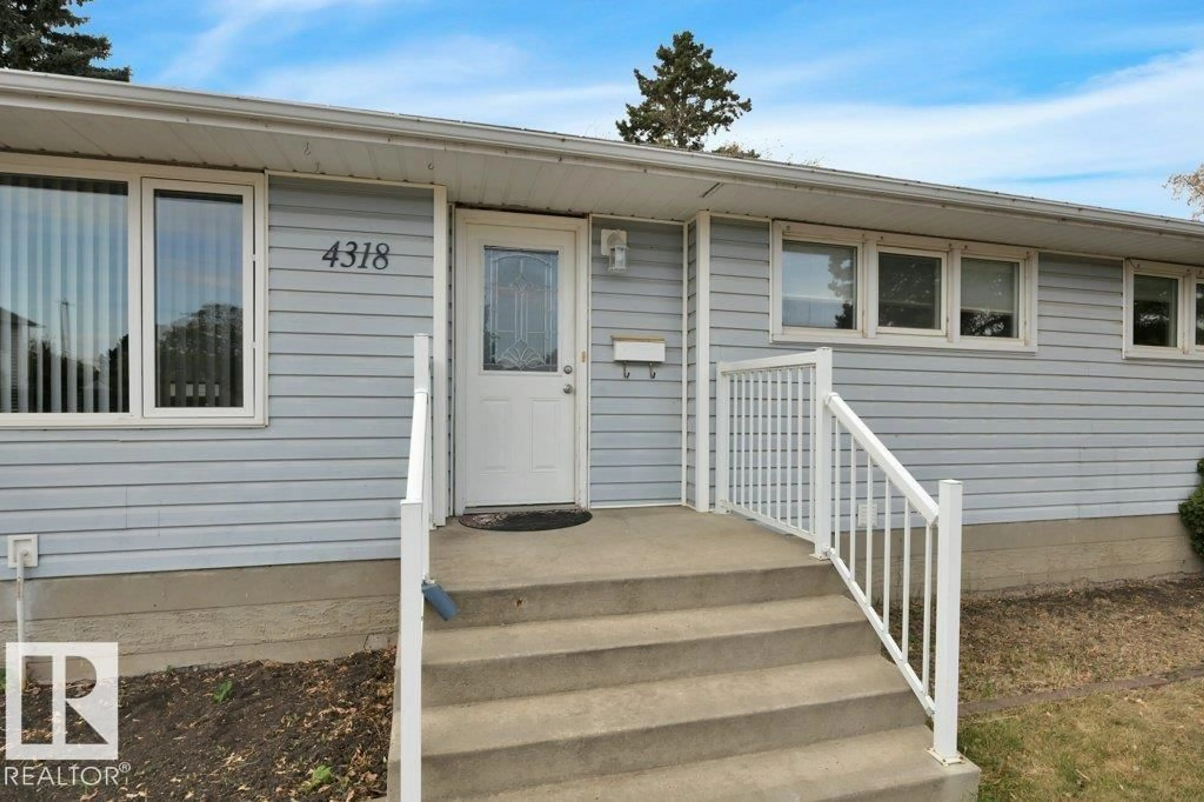 Home with vinyl exterior material, street for 4318 53A ST, Wetaskiwin Alberta T9A1S4