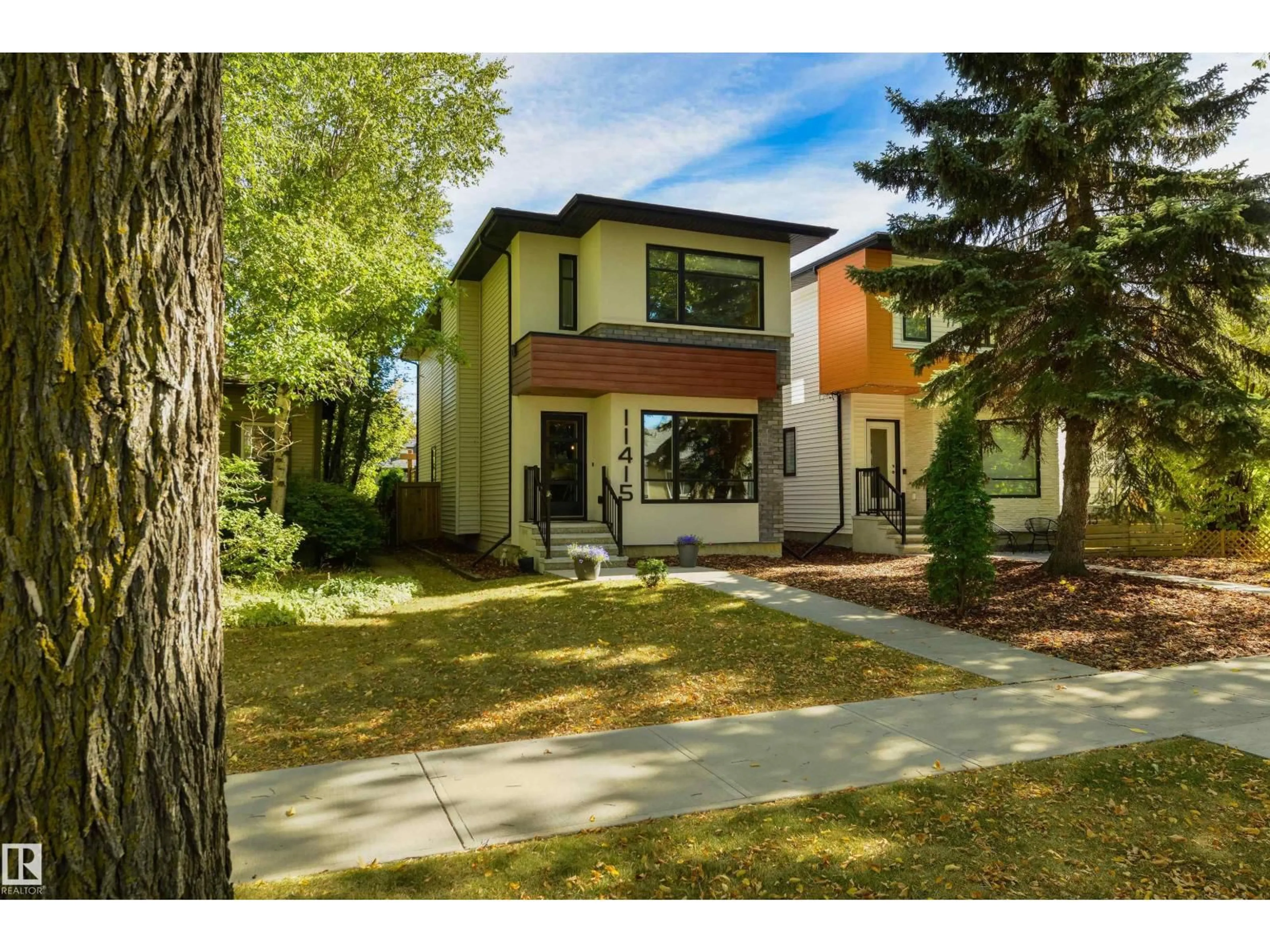 Home with brick exterior material, street for 11415 126 ST, Edmonton Alberta T5M0R7