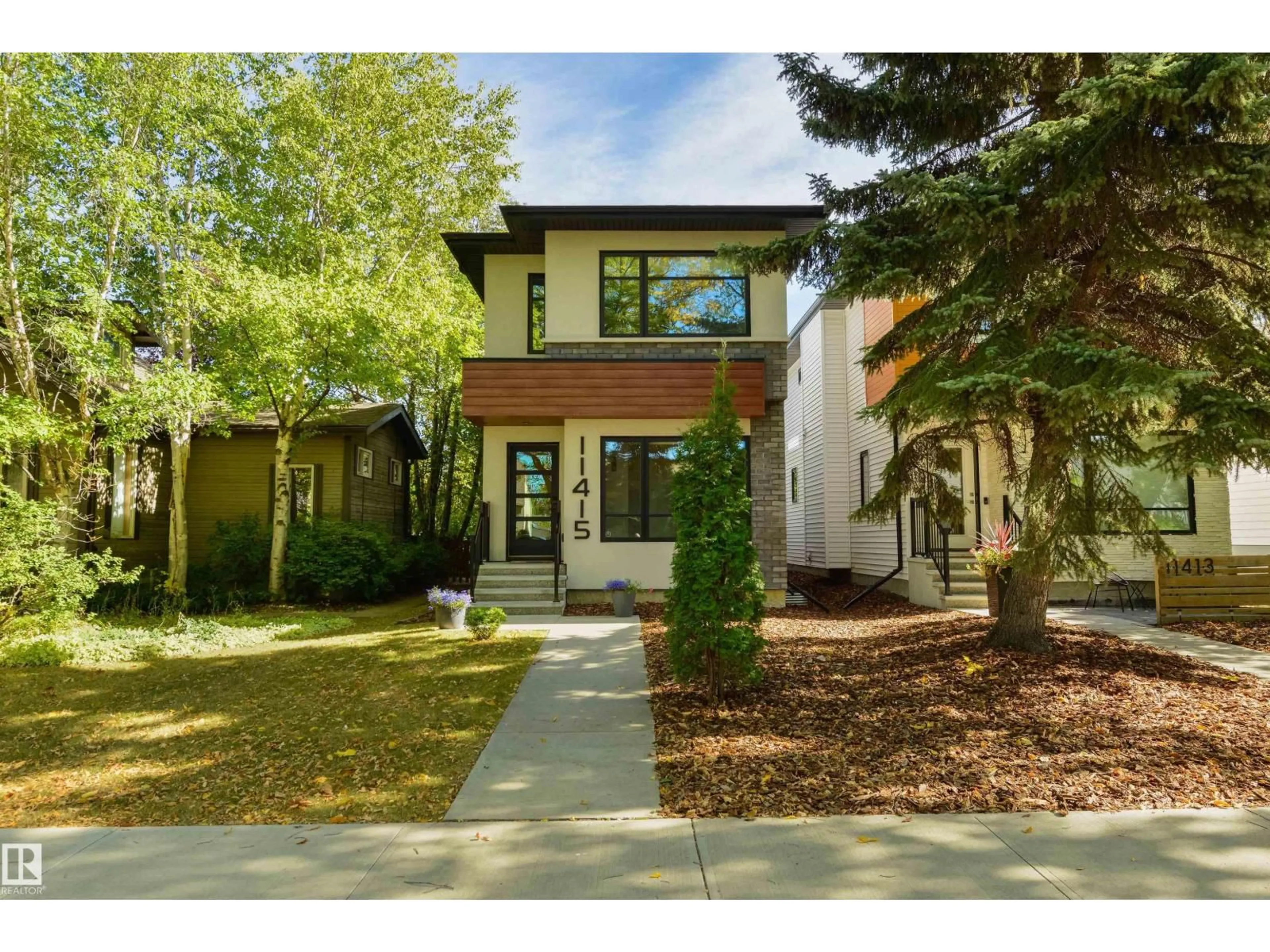 Home with brick exterior material, street for 11415 126 ST, Edmonton Alberta T5M0R7