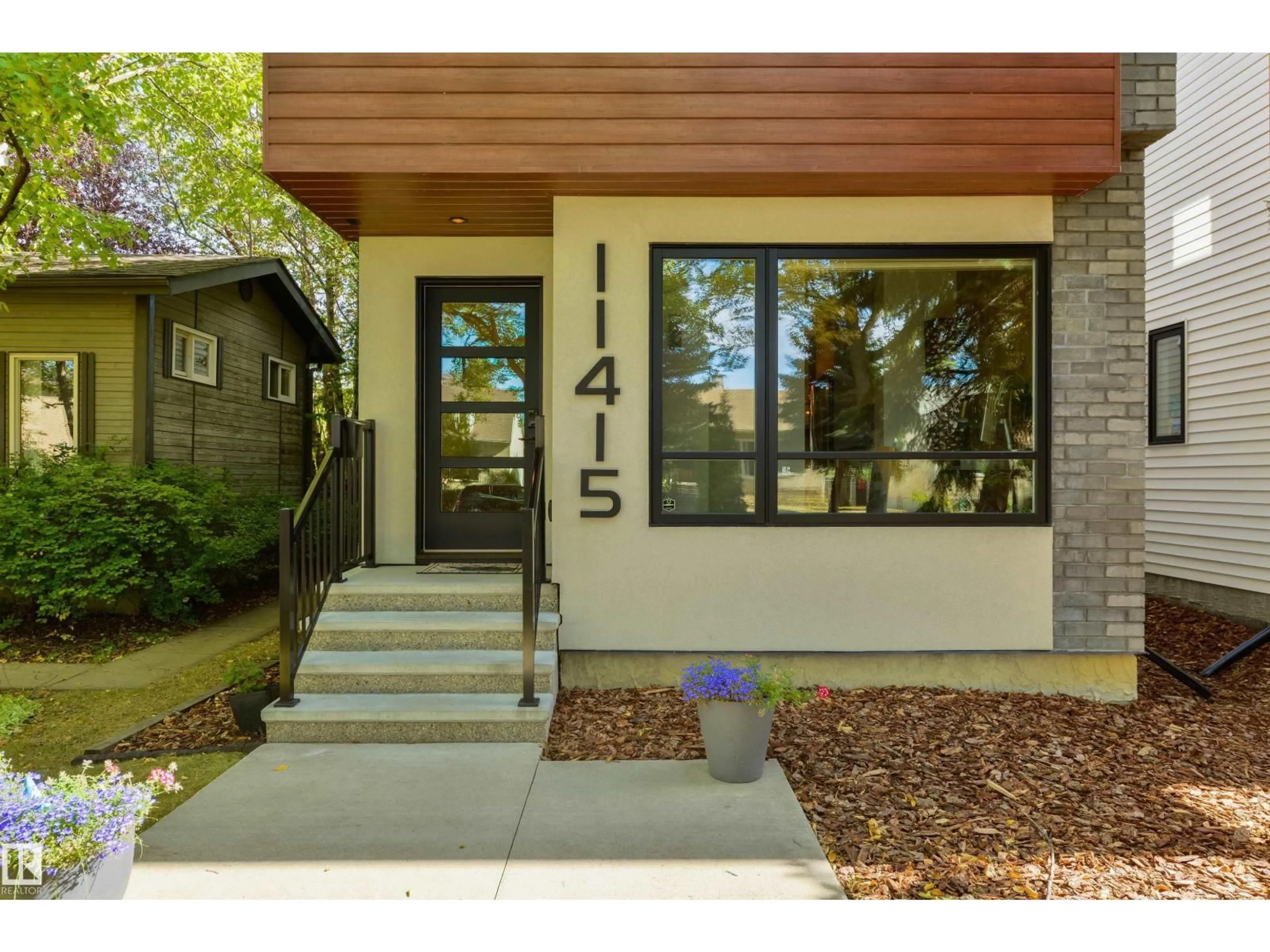 Home with brick exterior material, street for 11415 126 ST, Edmonton Alberta T5M0R7