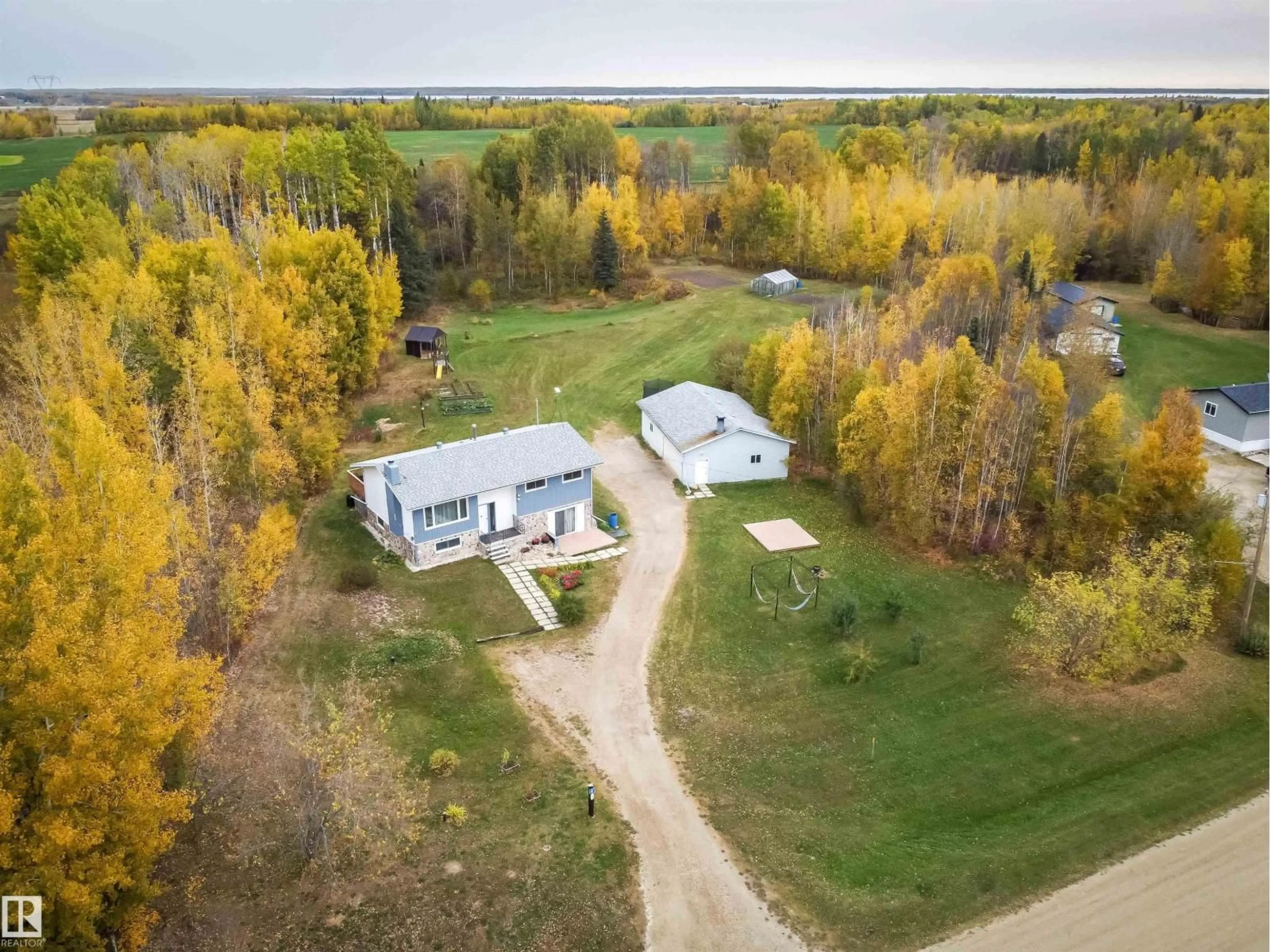 A pic from outside/outdoor area/front of a property/back of a property/a pic from drone, unknown for #4 - 54227 RGE ROAD 41, Rural Lac Ste. Anne County Alberta T0E0A1