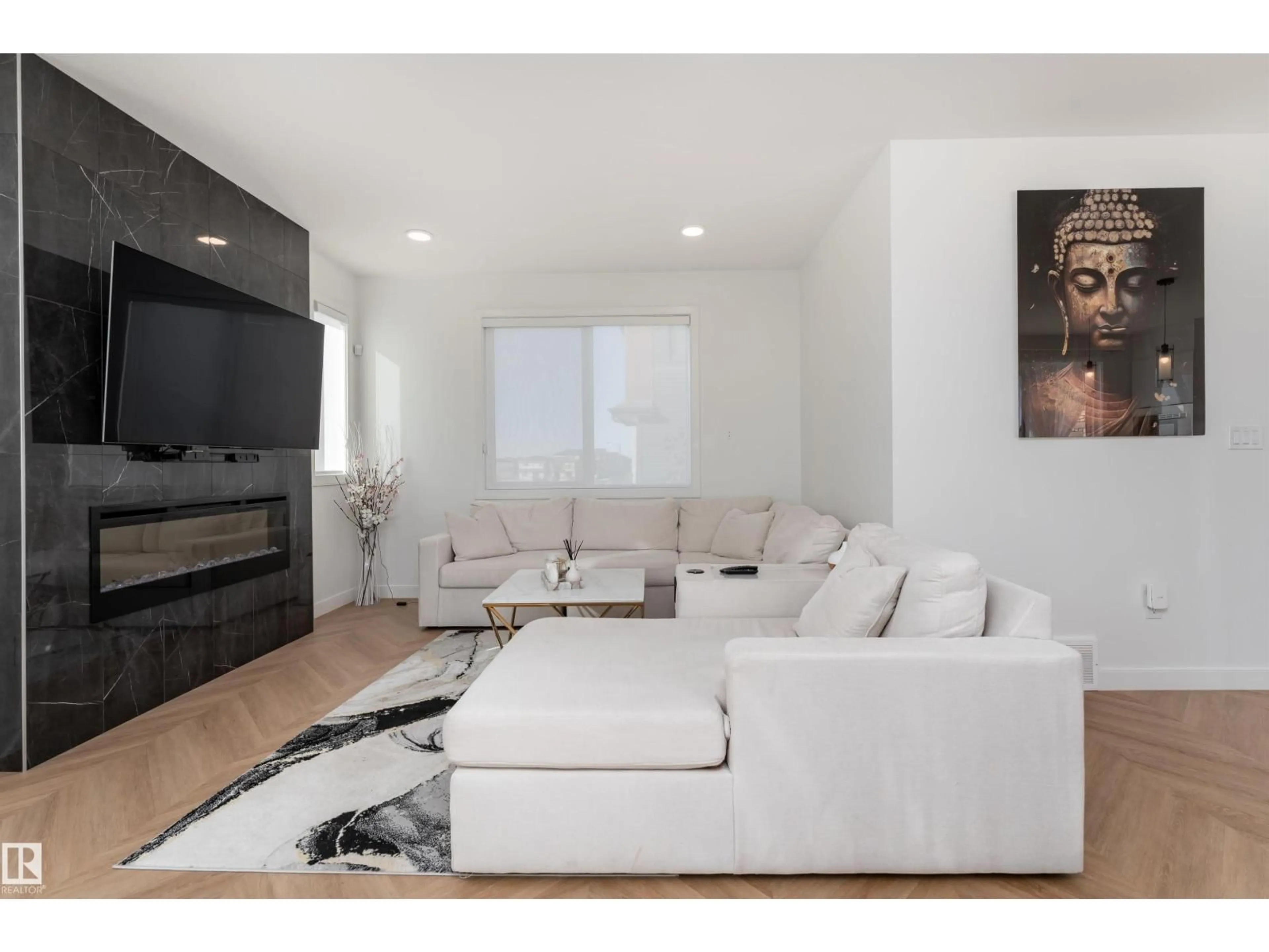 Living room with furniture, wood/laminate floor for SW - 4204 HAWTHORN RO, Edmonton Alberta T6X2Y7