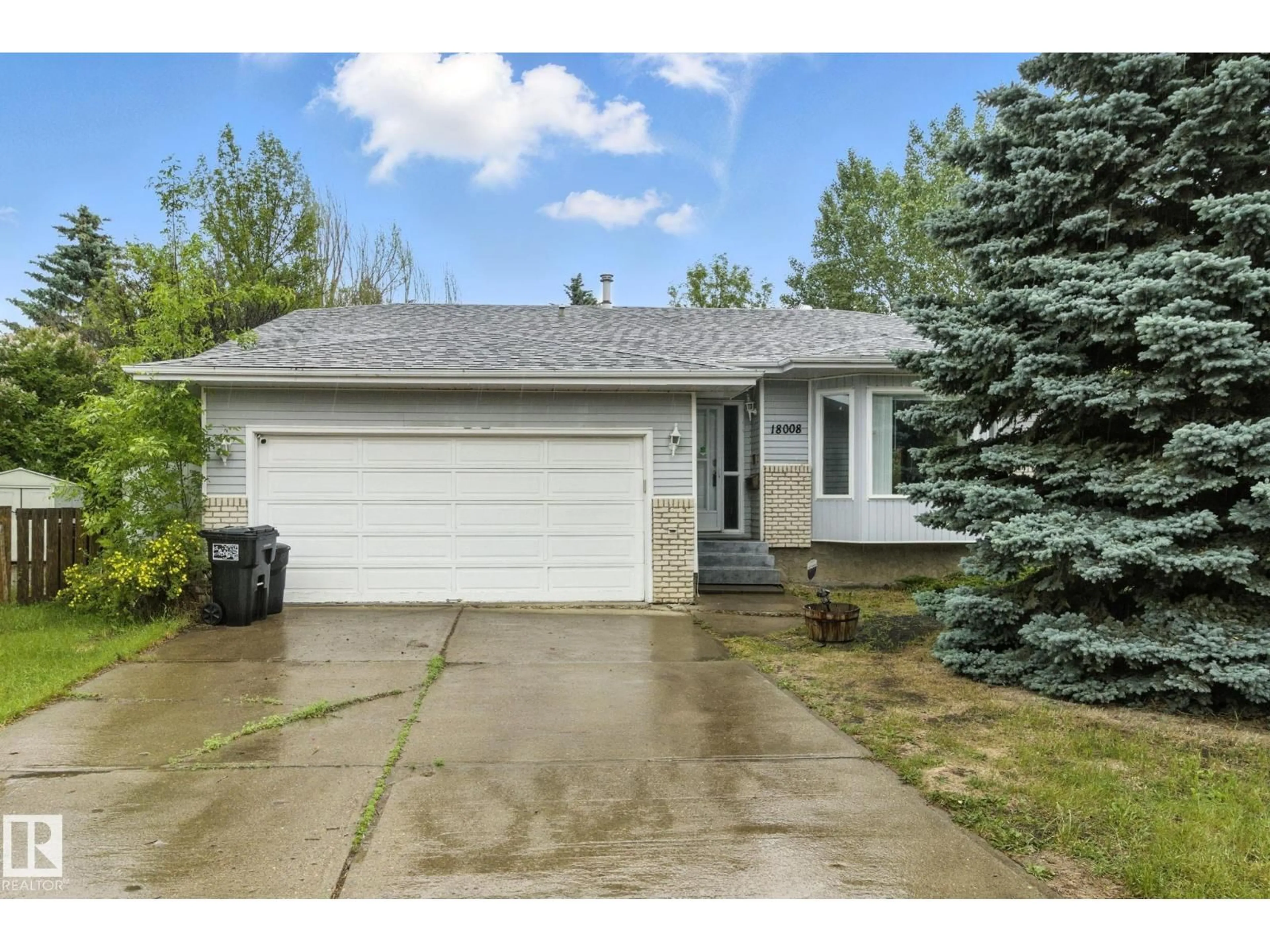 Home with vinyl exterior material, street for 18008 61 AV, Edmonton Alberta T6M1T2