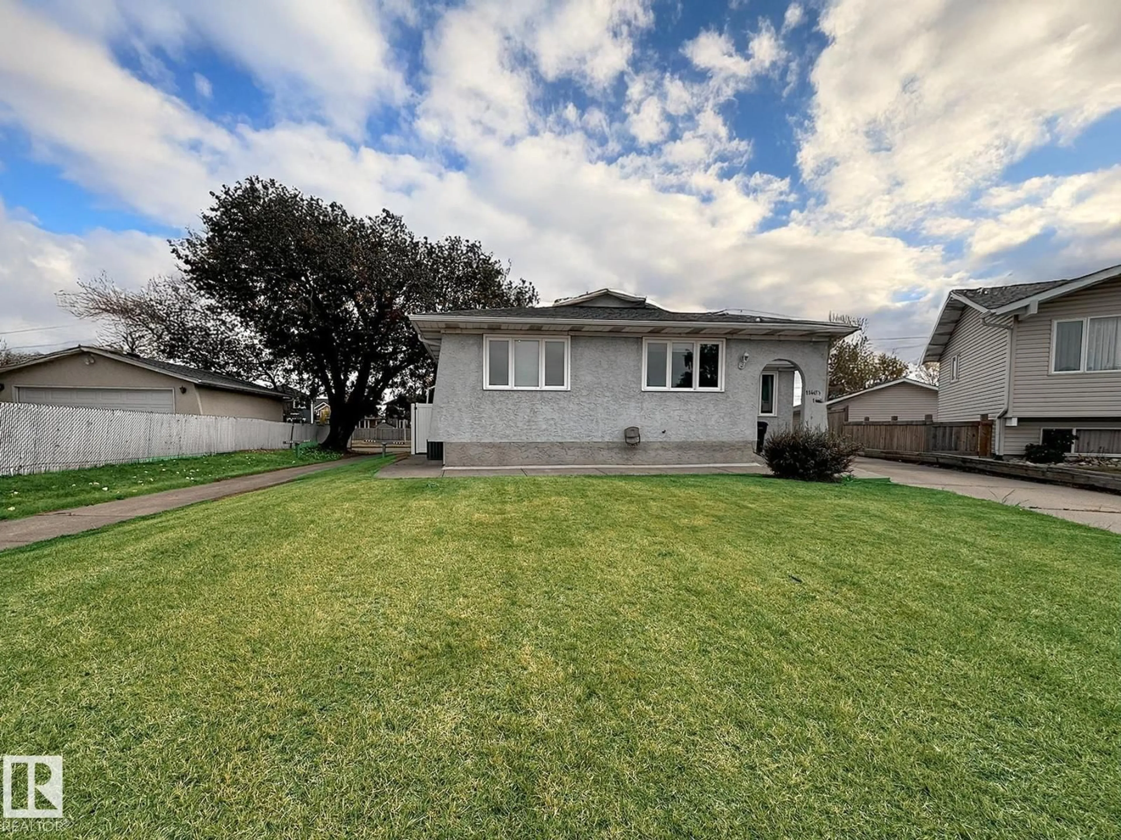 A pic from outside/outdoor area/front of a property/back of a property/a pic from drone, street for 11403 149 AV, Edmonton Alberta T5X1B9
