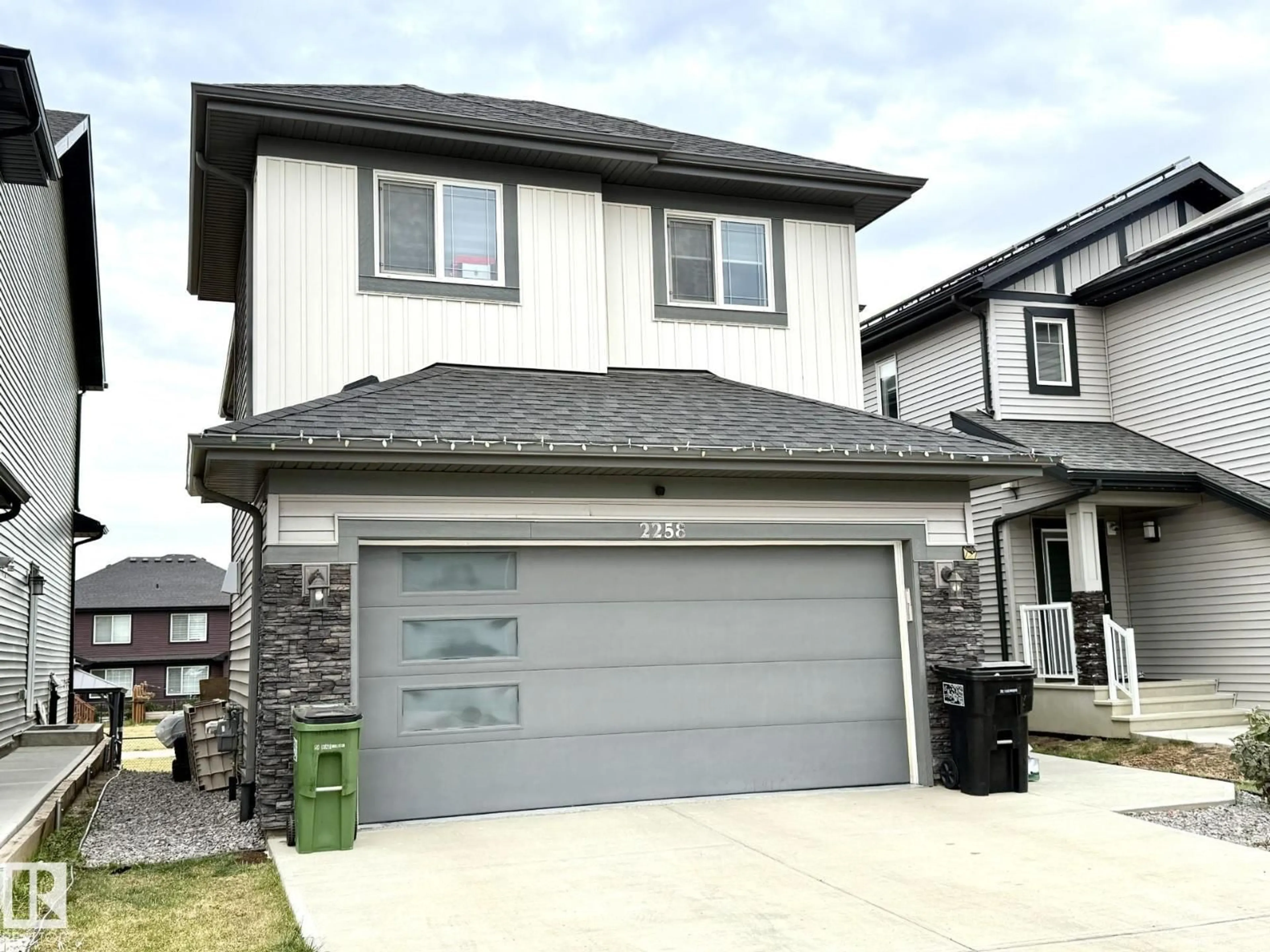 Home with vinyl exterior material, street for SW - 2258 57 ST, Edmonton Alberta T6X2P3