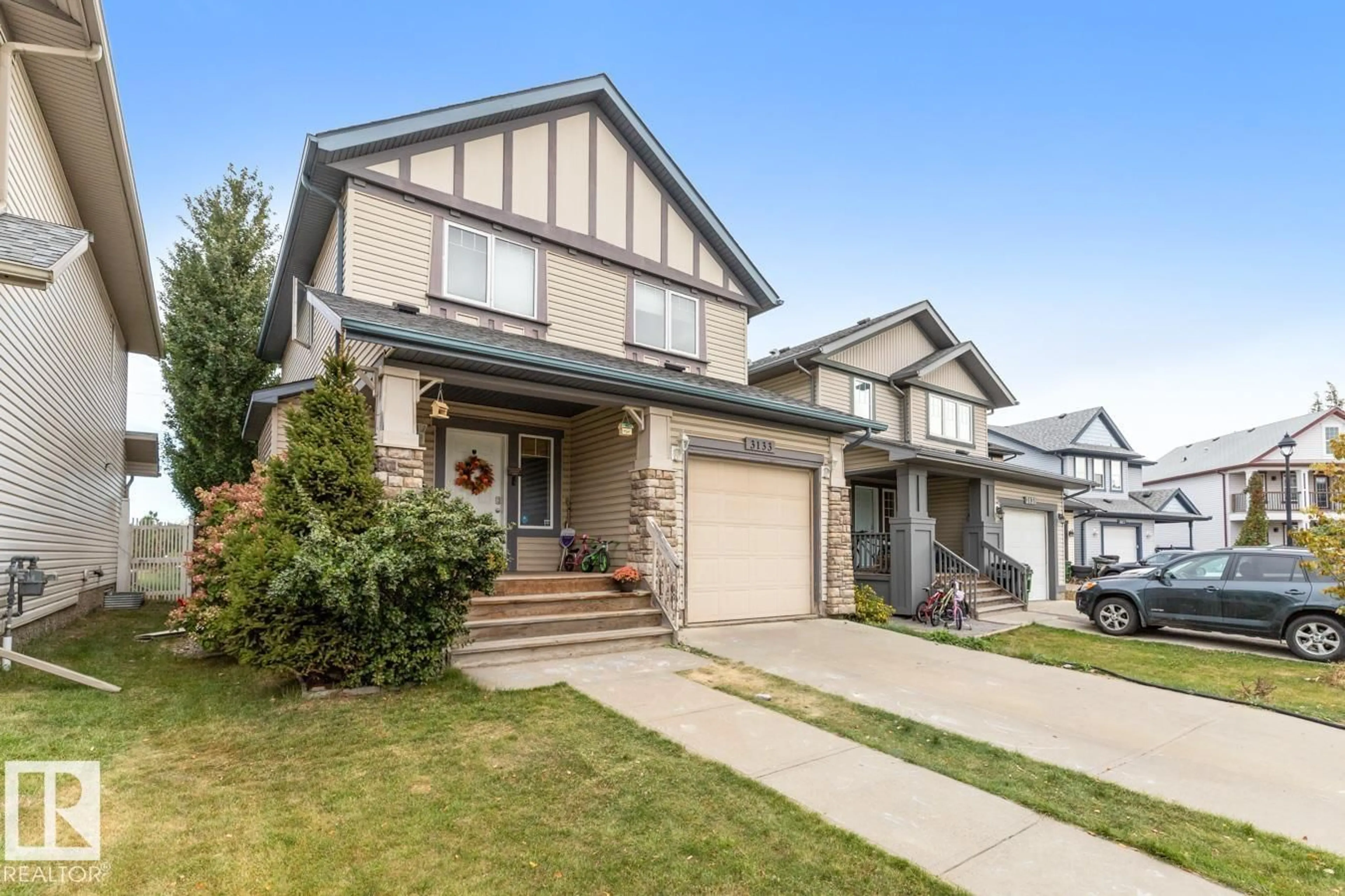 Home with vinyl exterior material, street for 3133 TRELLE LO, Edmonton Alberta T6R0A1