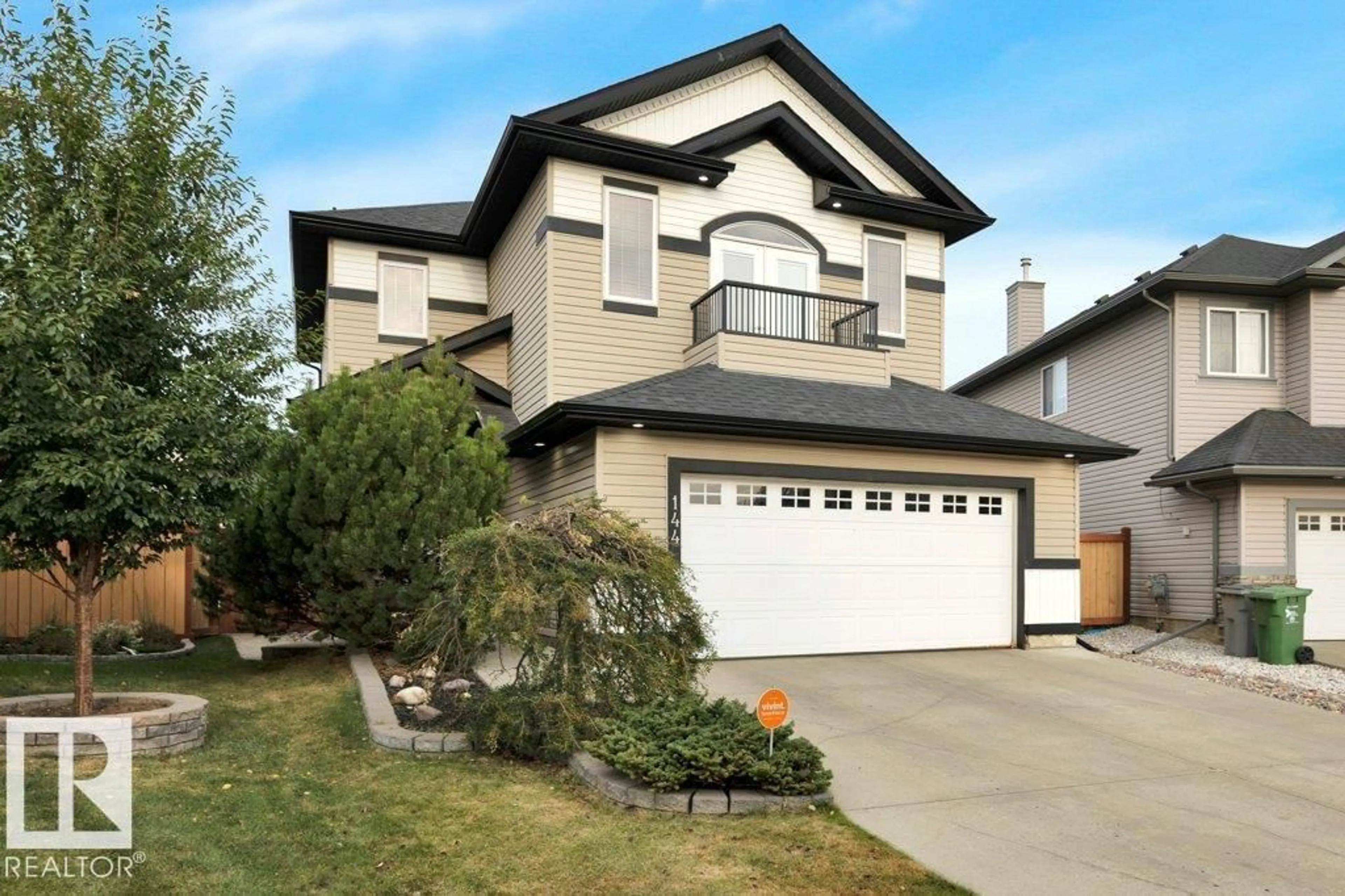 Home with vinyl exterior material, street for 144 RUE MARQUET, Beaumont Alberta T4X1W3