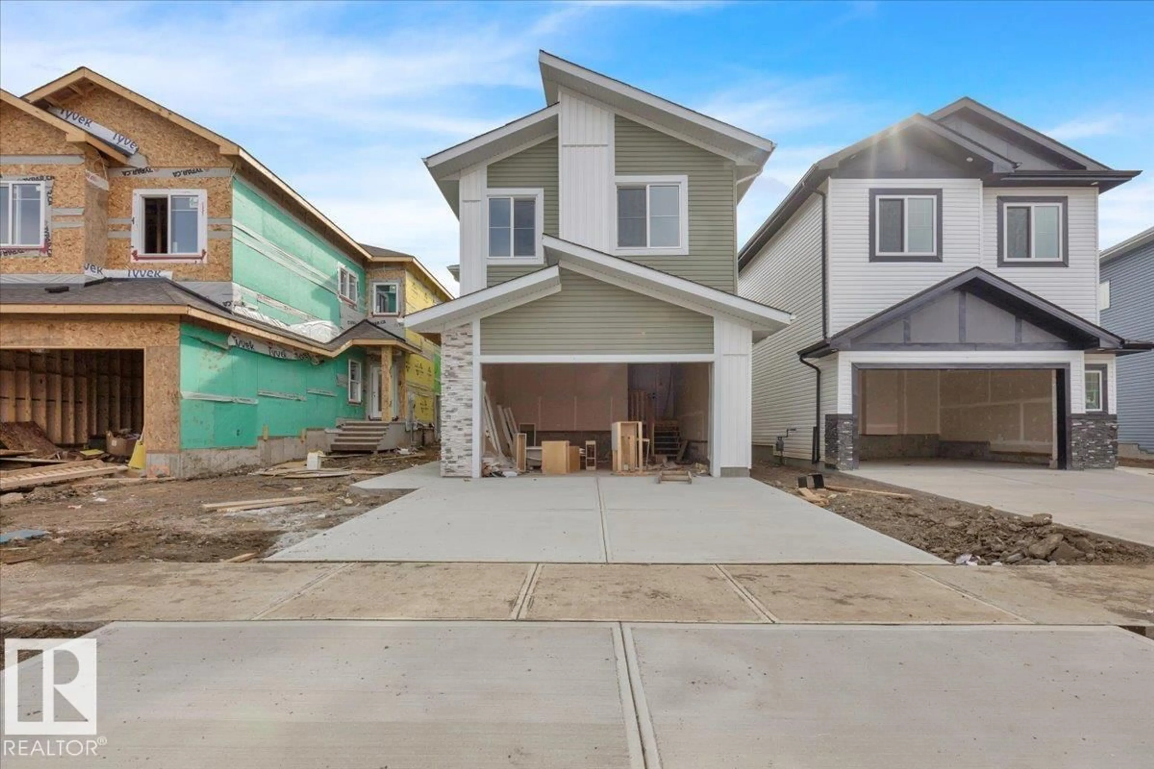 Home with vinyl exterior material, street for 57 BLACKBIRD BEND, Fort Saskatchewan Alberta T8L0G6