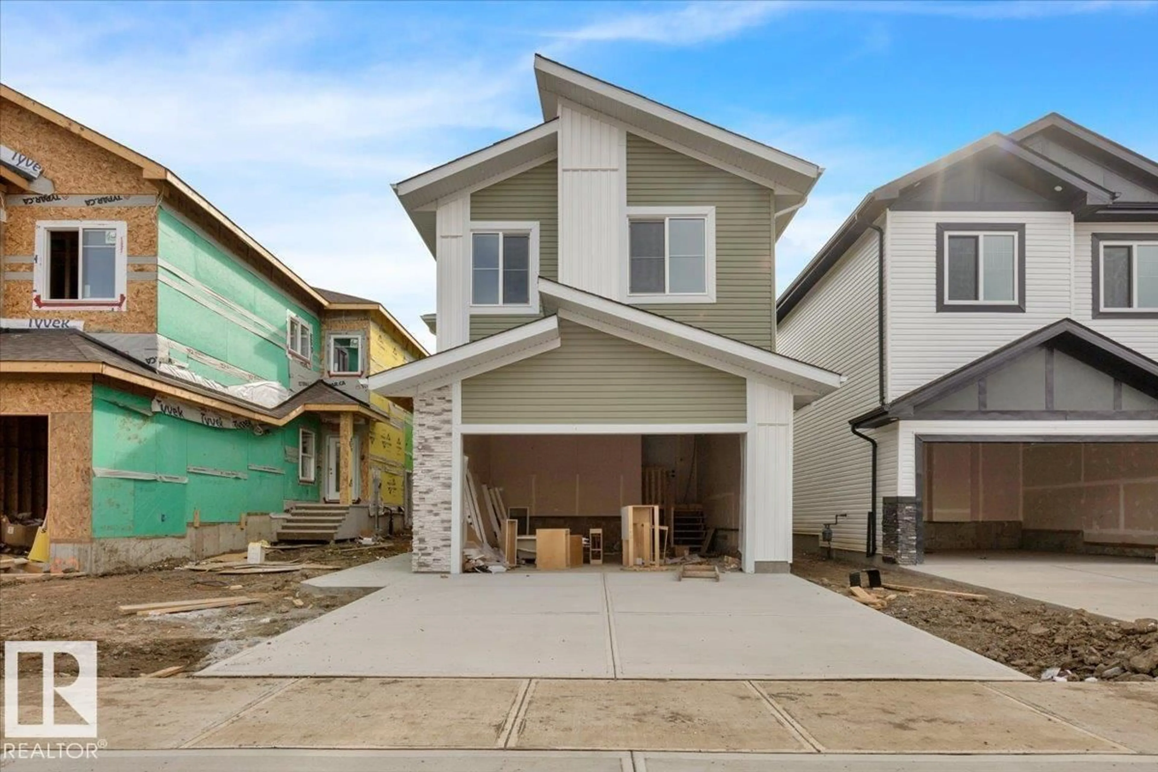 Home with vinyl exterior material, street for 57 BLACKBIRD BEND, Fort Saskatchewan Alberta T8L0G6