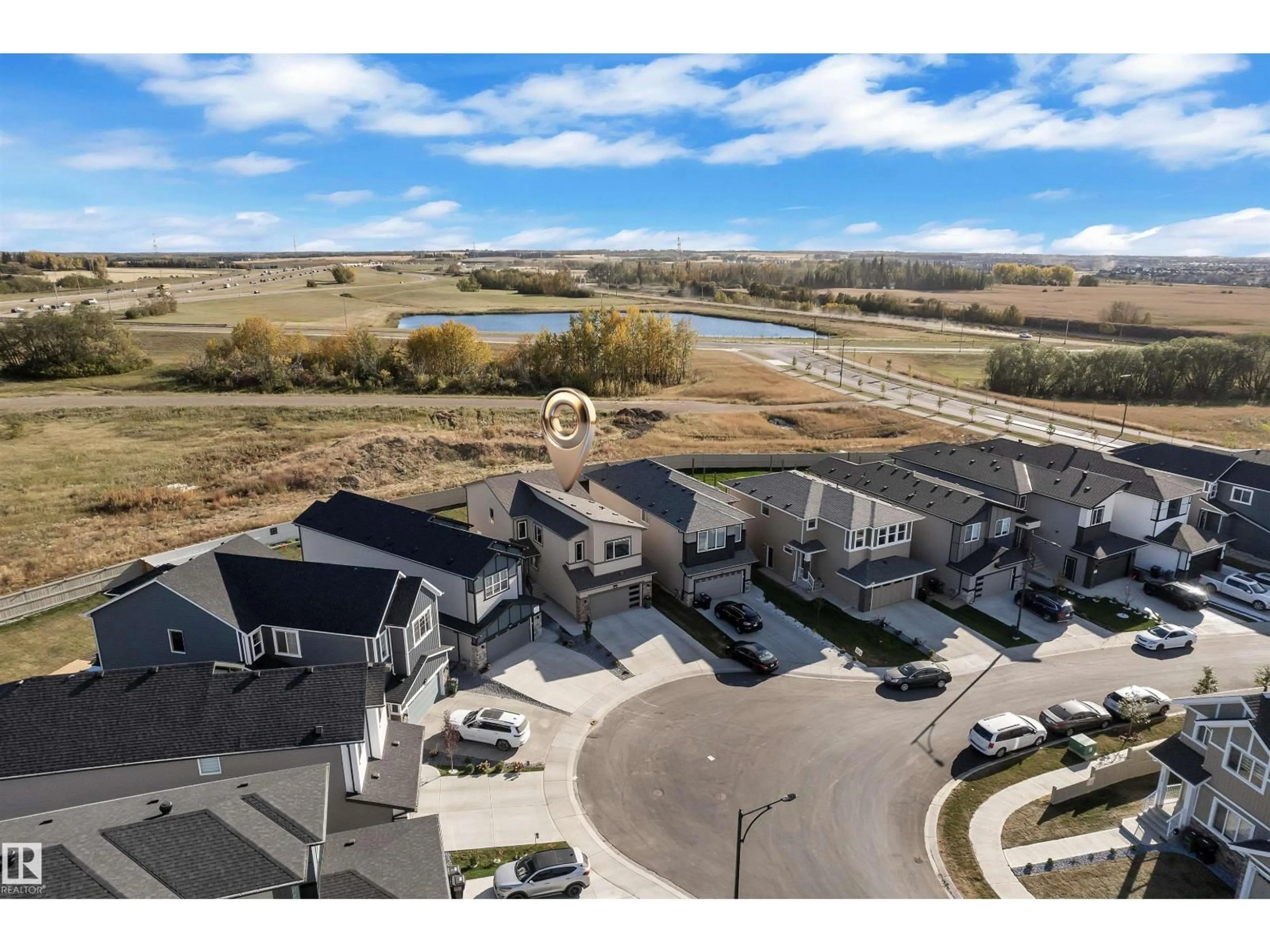 A pic from outside/outdoor area/front of a property/back of a property/a pic from drone, water/lake/river/ocean view for 407 30 AV, Edmonton Alberta T6T2V7