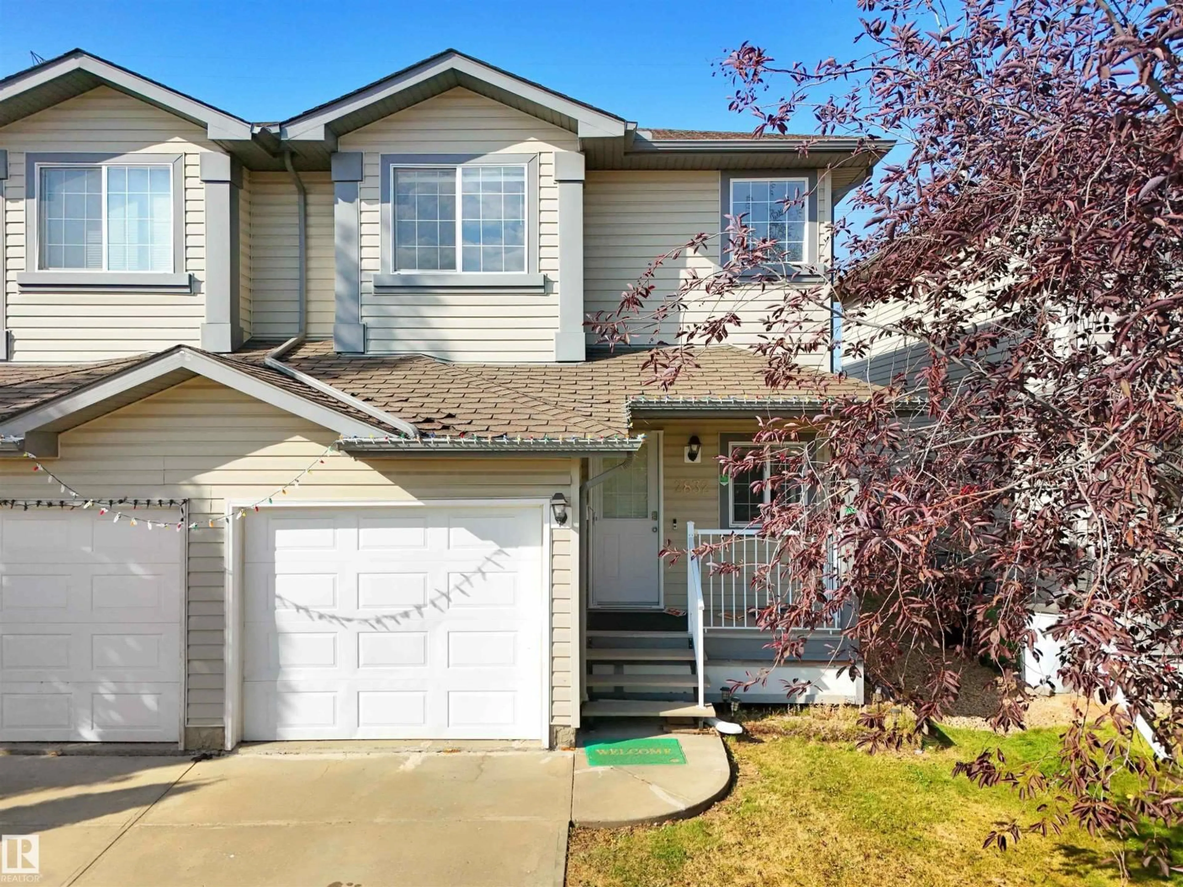 Home with vinyl exterior material, street for 2832 26 ST, Edmonton Alberta T6T2A2