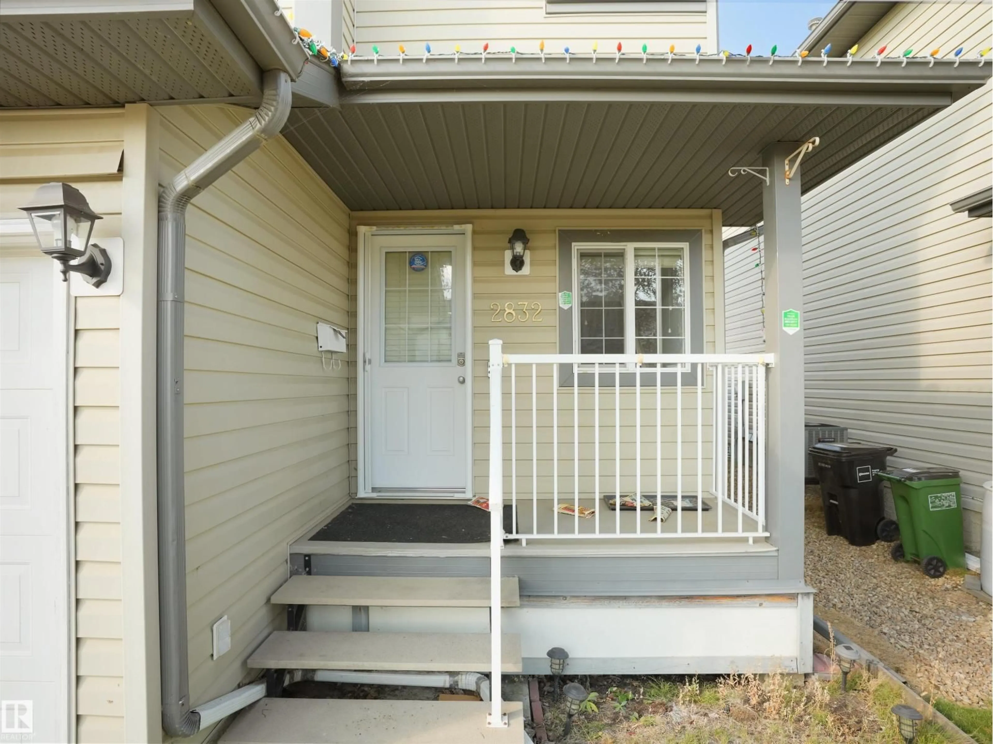 Home with vinyl exterior material, street for 2832 26 ST, Edmonton Alberta T6T2A2