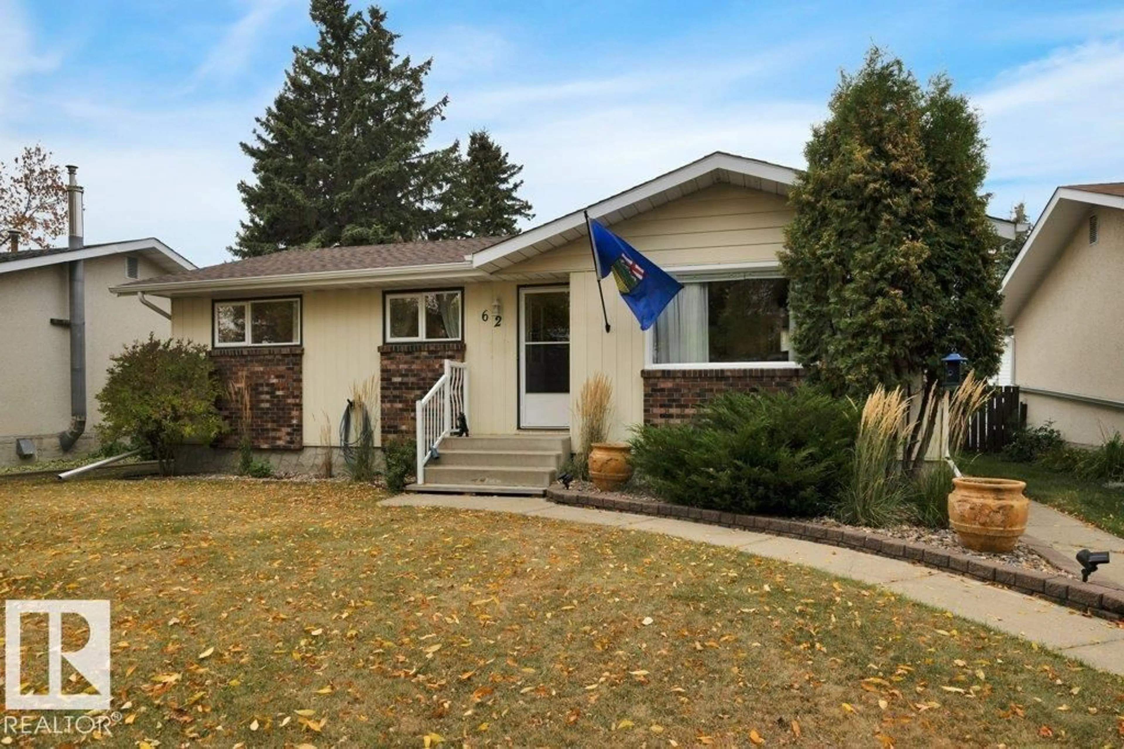 Home with vinyl exterior material, street for 62 CORINTHIA DR, Leduc Alberta T9E4M6