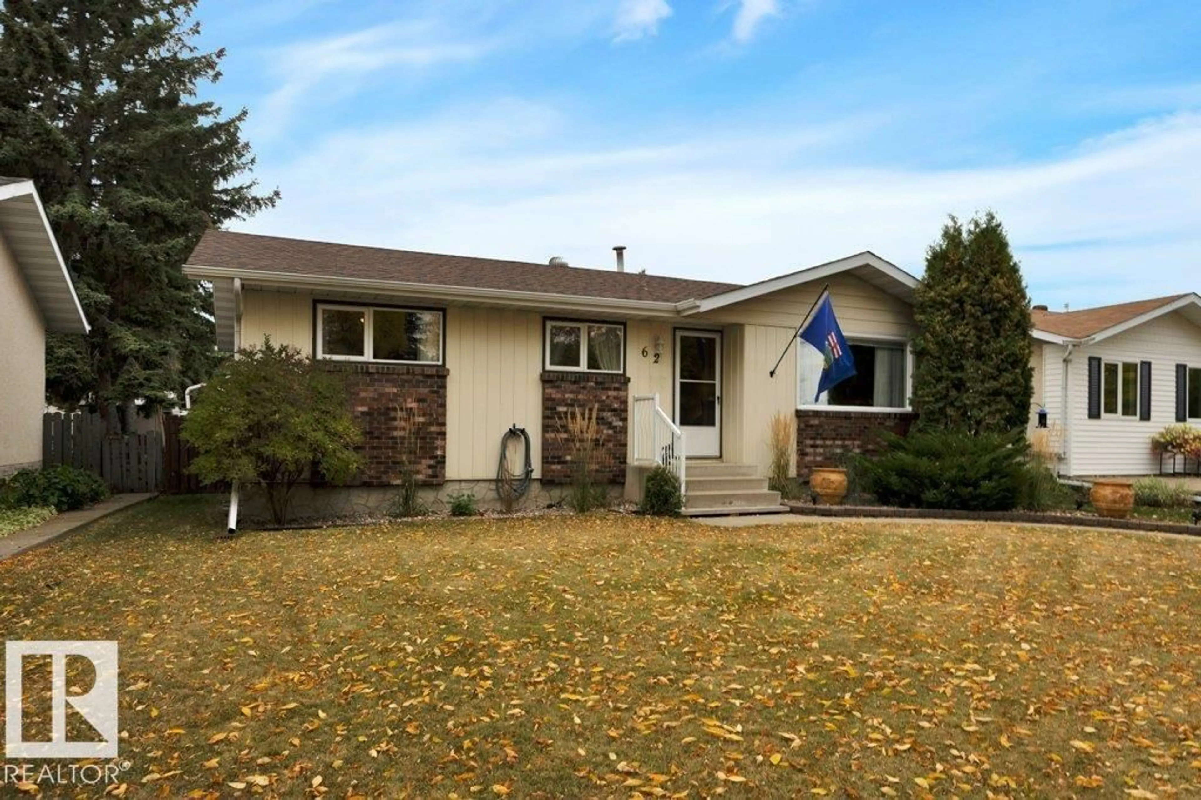 Home with vinyl exterior material, street for 62 CORINTHIA DR, Leduc Alberta T9E4M6