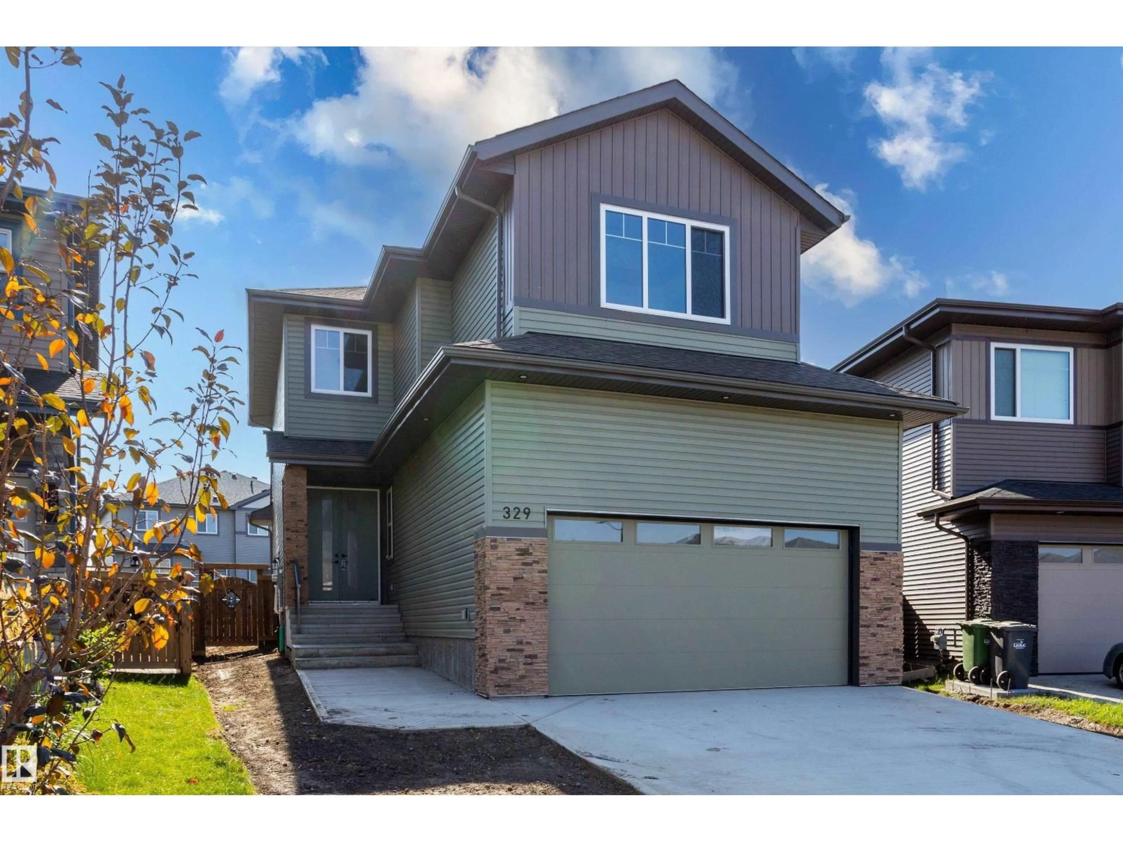 Home with vinyl exterior material, street for 329 BALSAM LI, Leduc Alberta T9E1L2