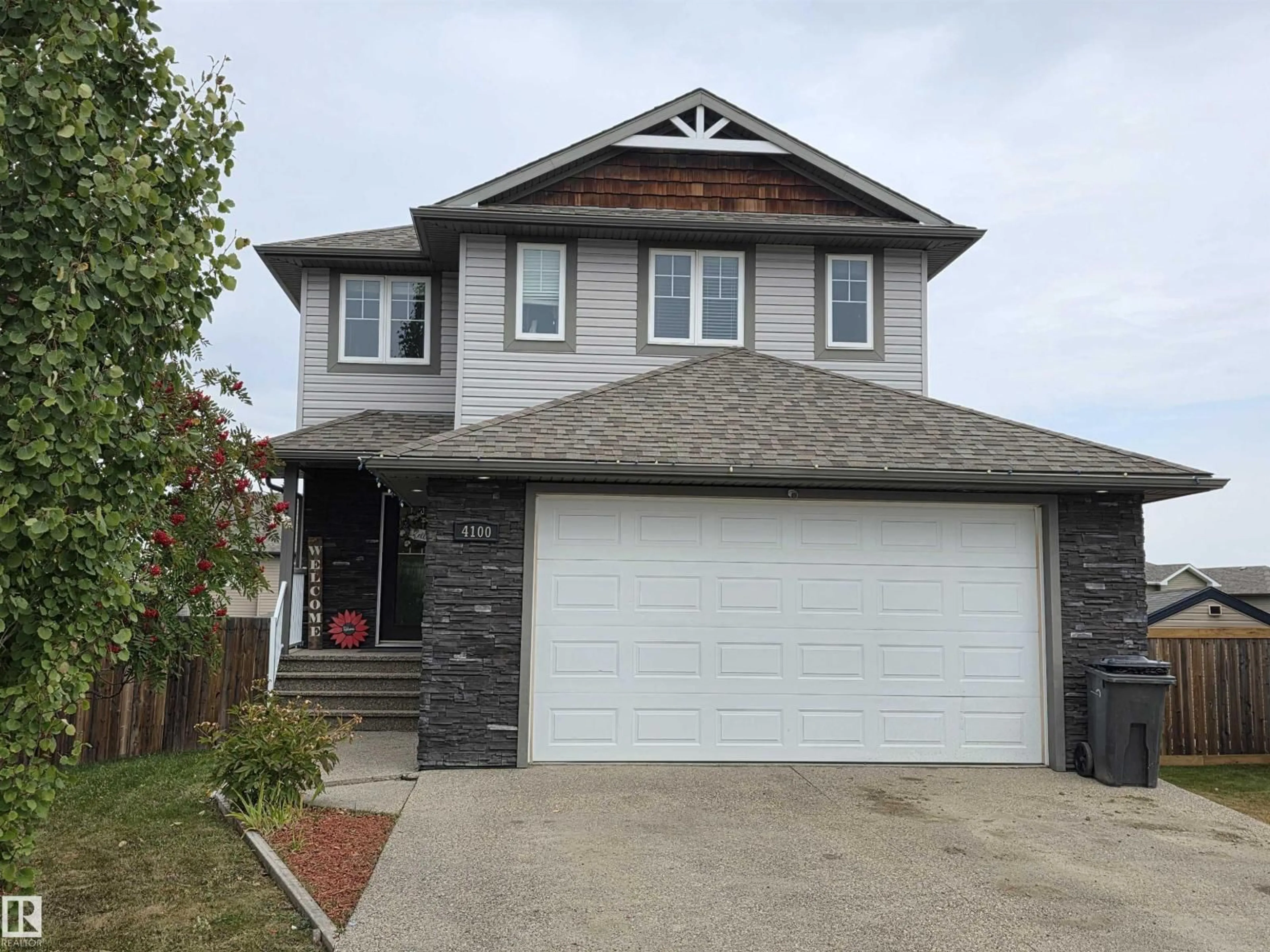 Home with vinyl exterior material, street for 4100 41A AV, Drayton Valley Alberta T7A0B4