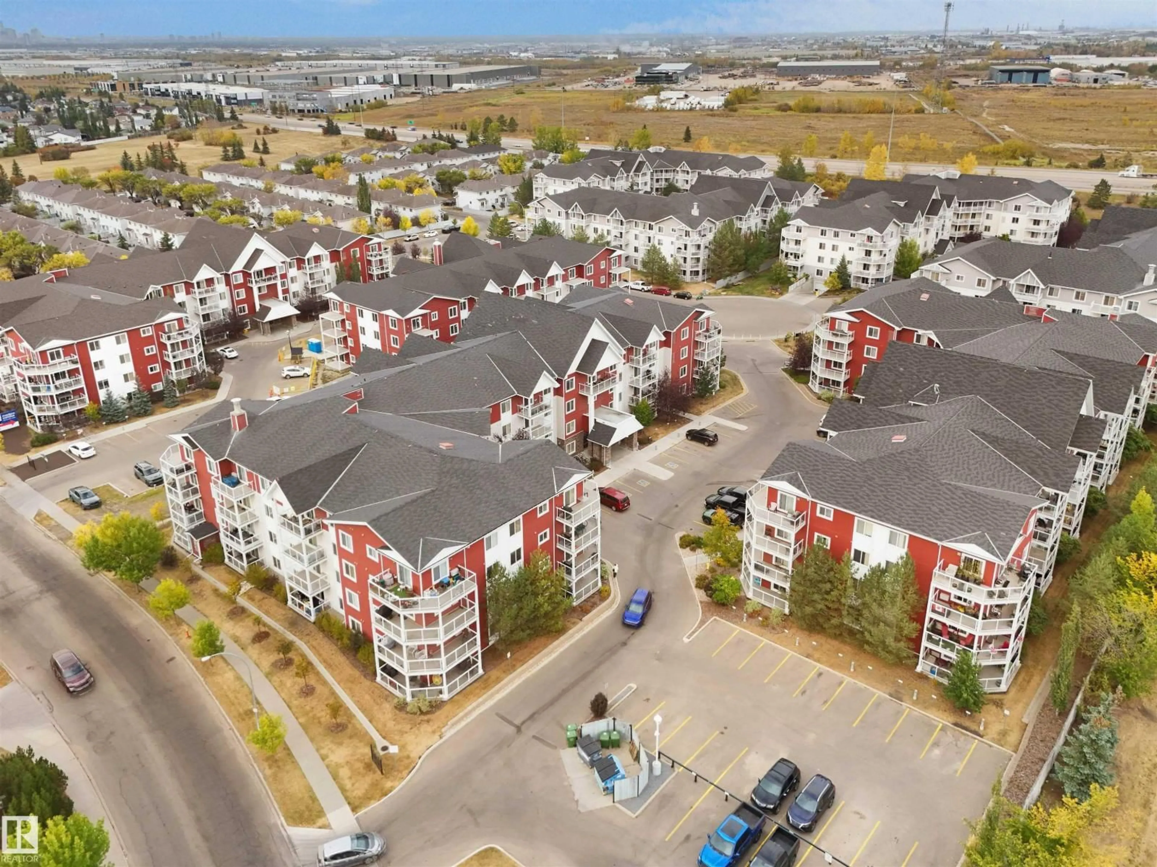 A pic from outside/outdoor area/front of a property/back of a property/a pic from drone, city buildings view from balcony for #101 - 2207 44 AV NW, Edmonton Alberta T6T0T2