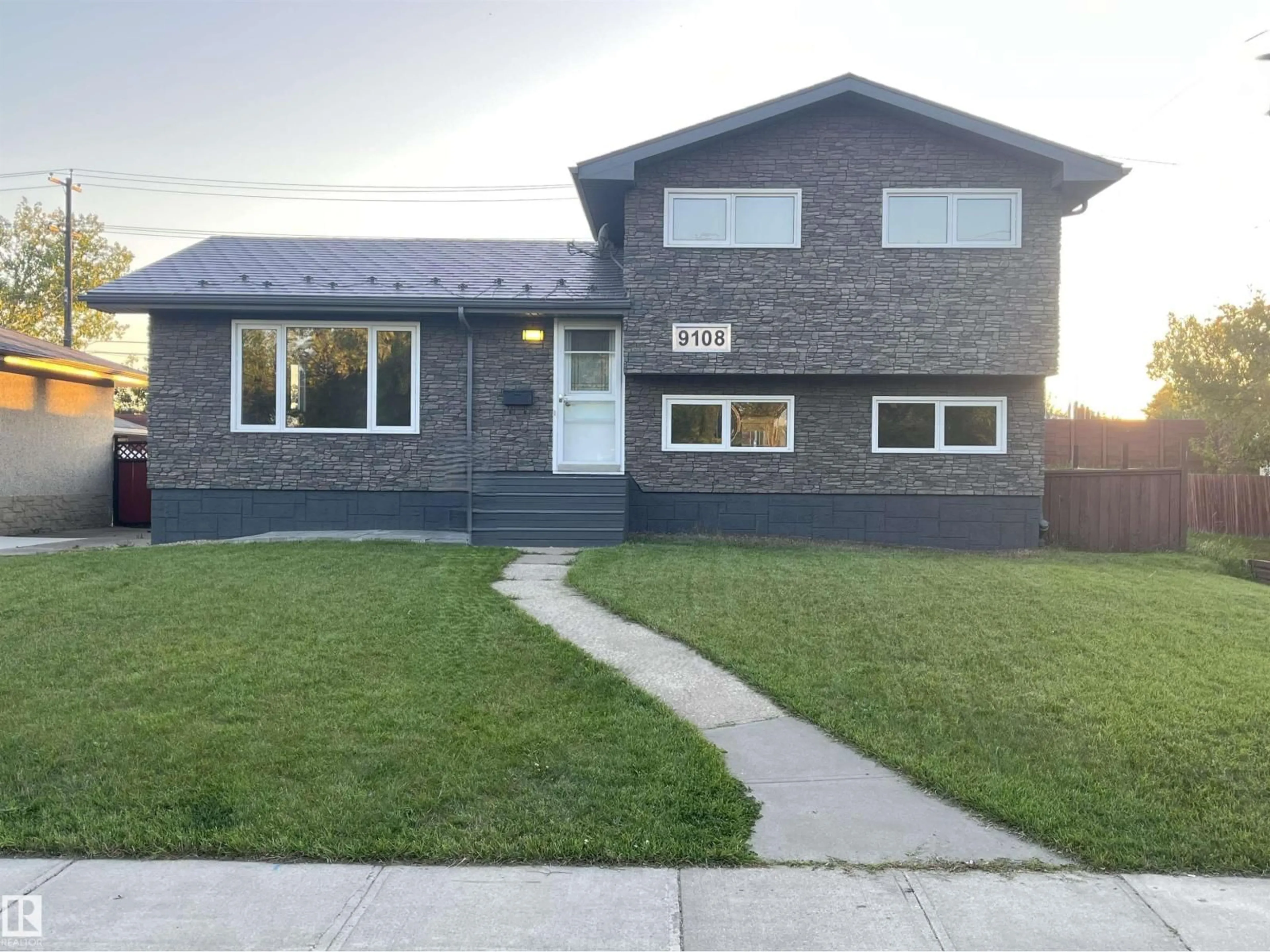 Home with vinyl exterior material, street for 9108 169 ST, Edmonton Alberta T5R2X1