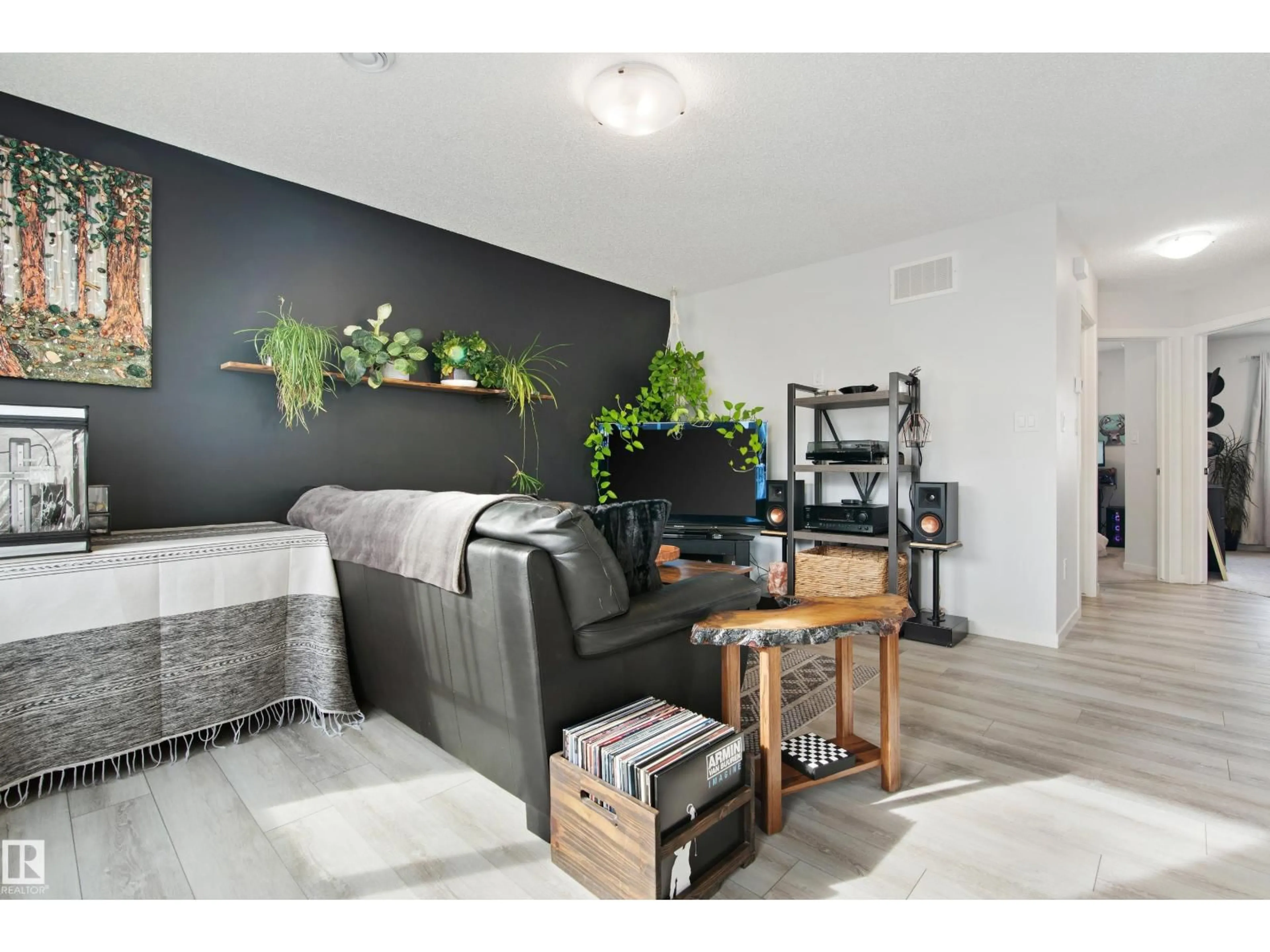 Living room with furniture, wood/laminate floor for 84 - 17832 78 ST, Edmonton Alberta T5Z0P7