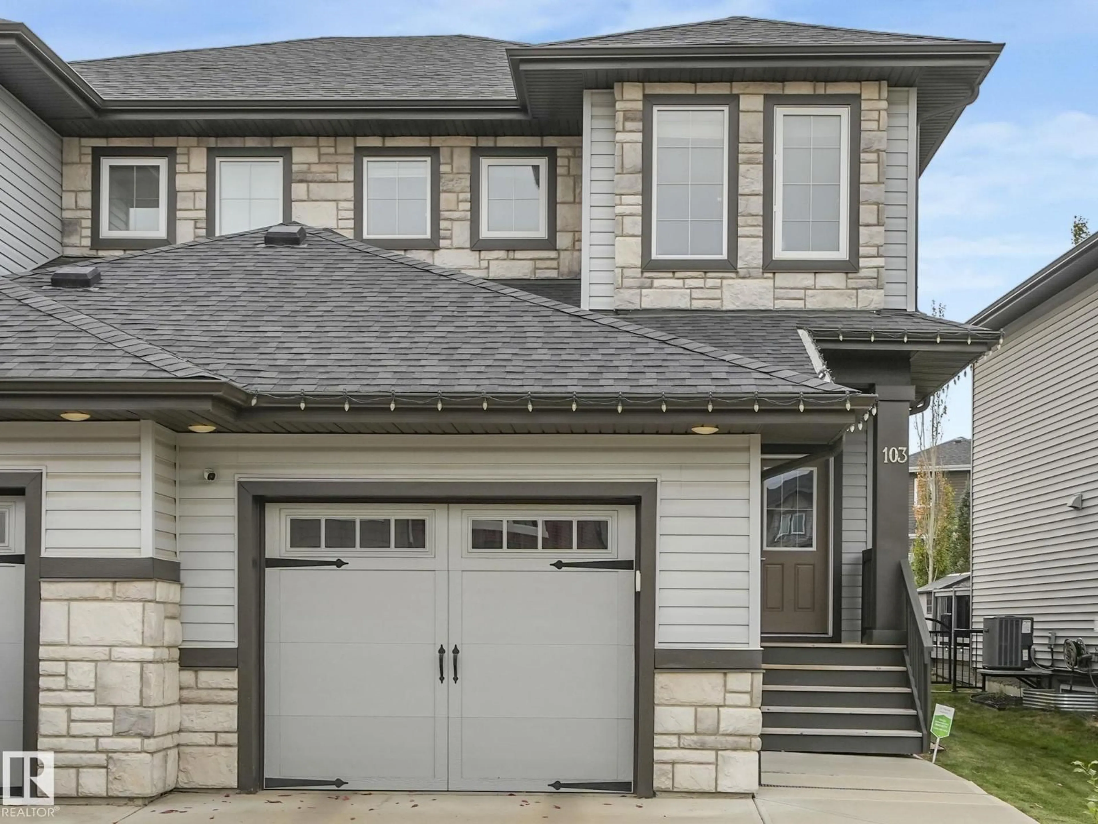 Home with vinyl exterior material, street for 103 AMBERLEY WY, Sherwood Park Alberta T8H0P5