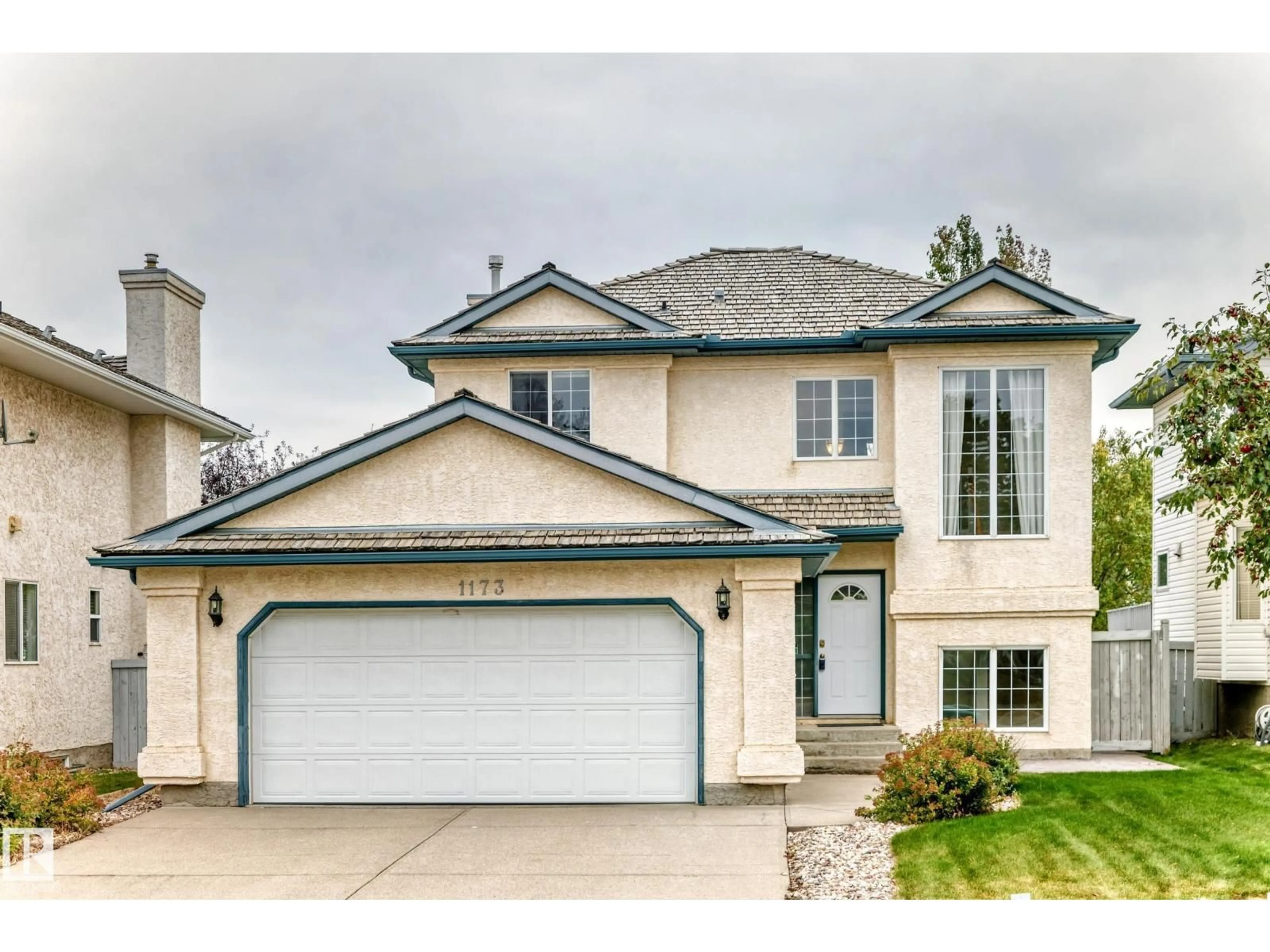 Home with vinyl exterior material, street for 1173 CARTER CREST RD, Edmonton Alberta T6R2L8