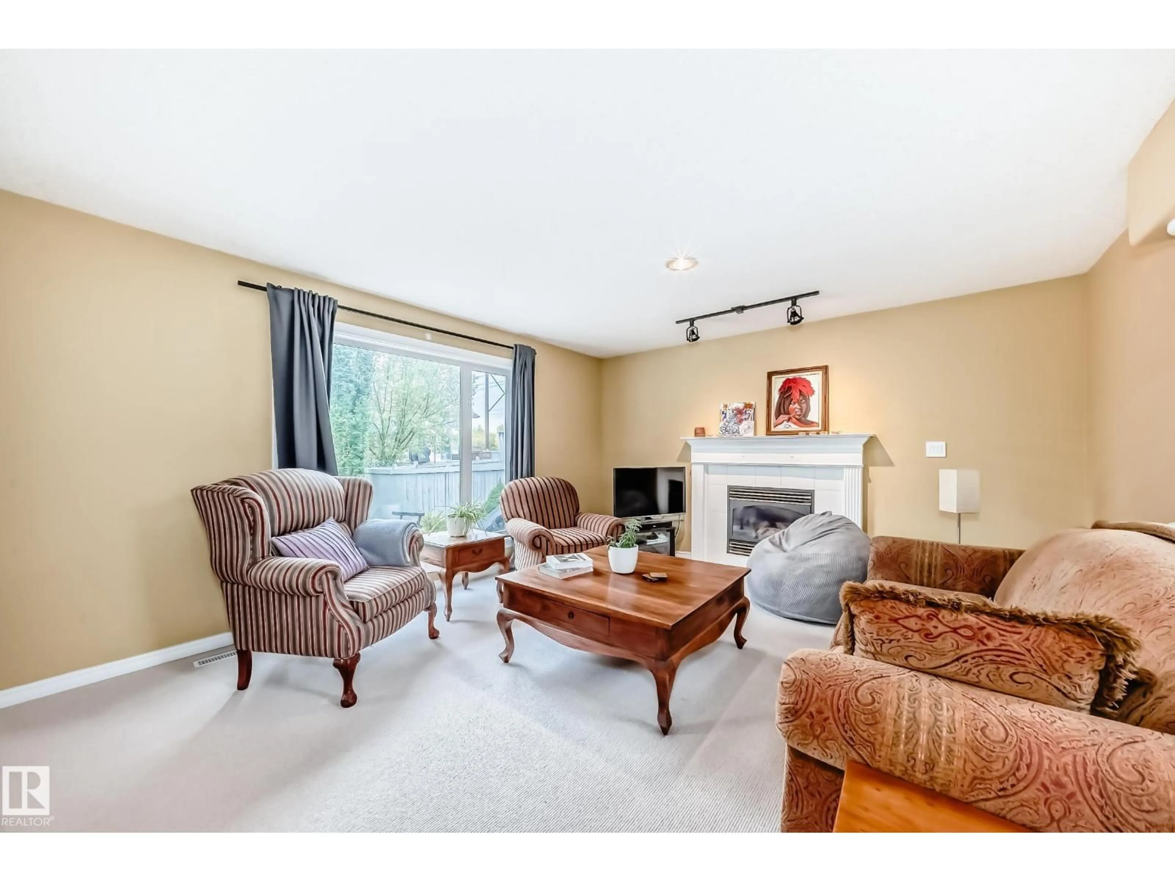 Living room with furniture, unknown for 1173 CARTER CREST RD, Edmonton Alberta T6R2L8