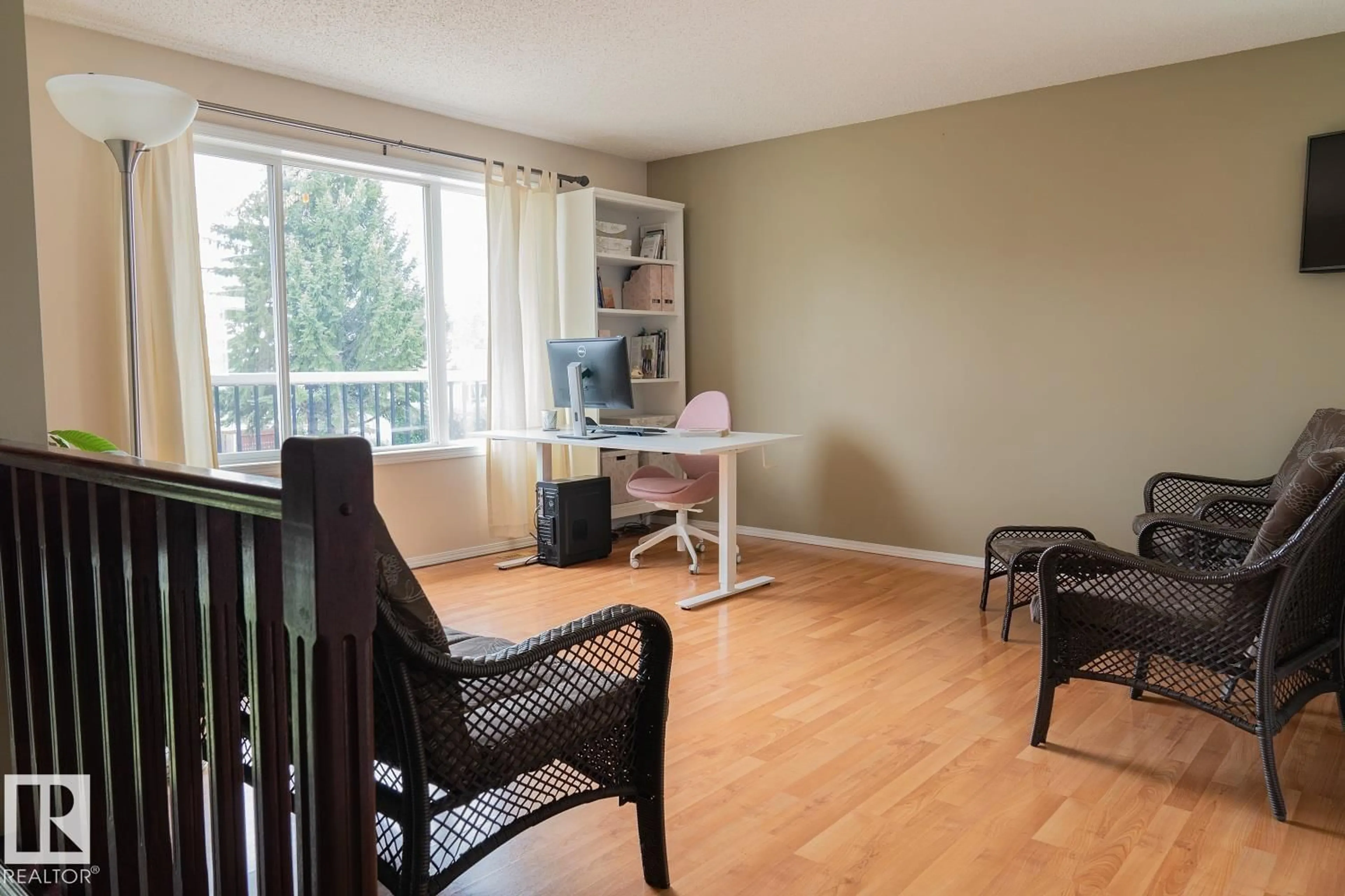 Living room with furniture, wood/laminate floor for 4204 50A AV, Cold Lake Alberta T9M2A5