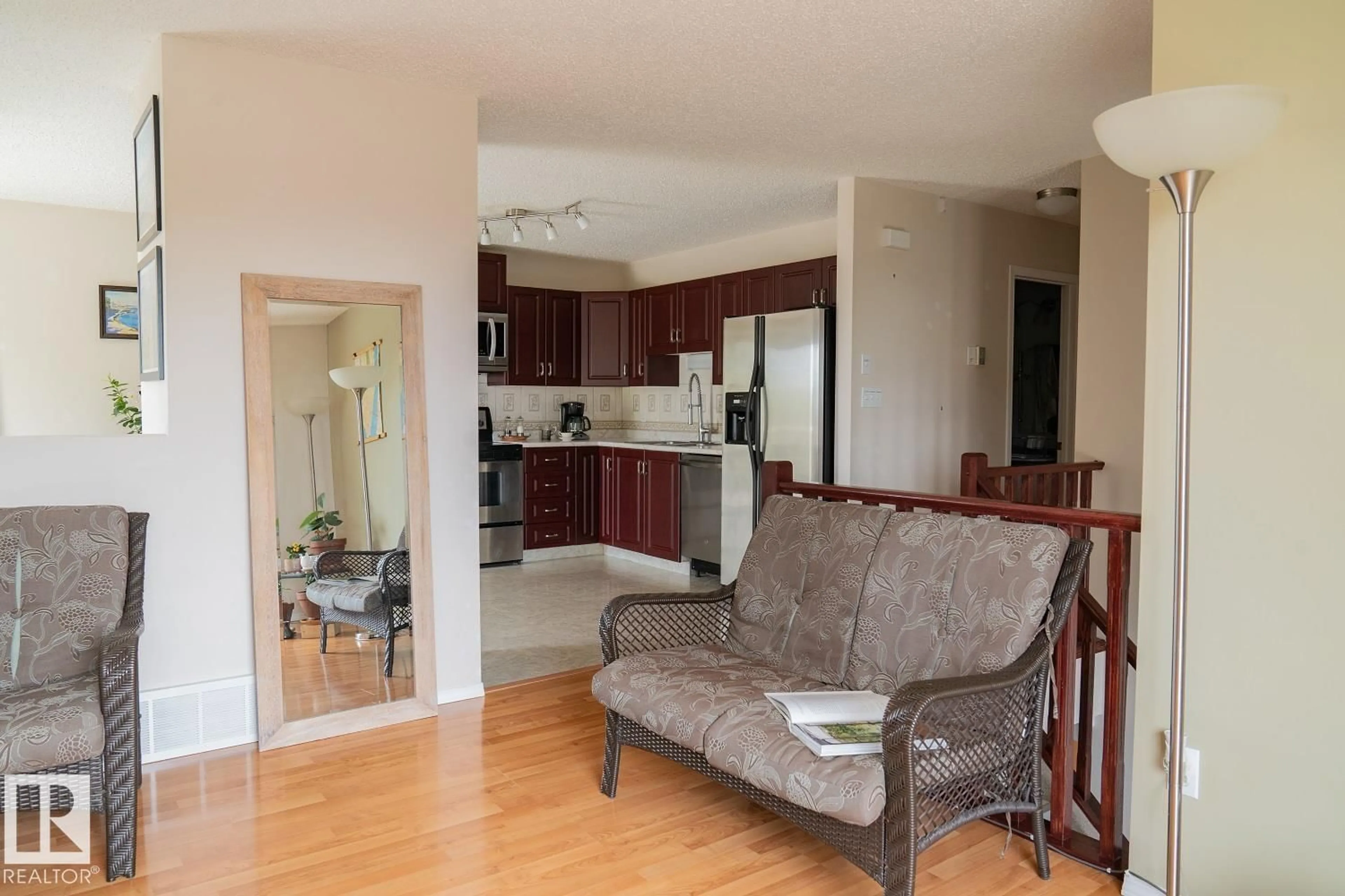 Living room with furniture, wood/laminate floor for 4204 50A AV, Cold Lake Alberta T9M2A5