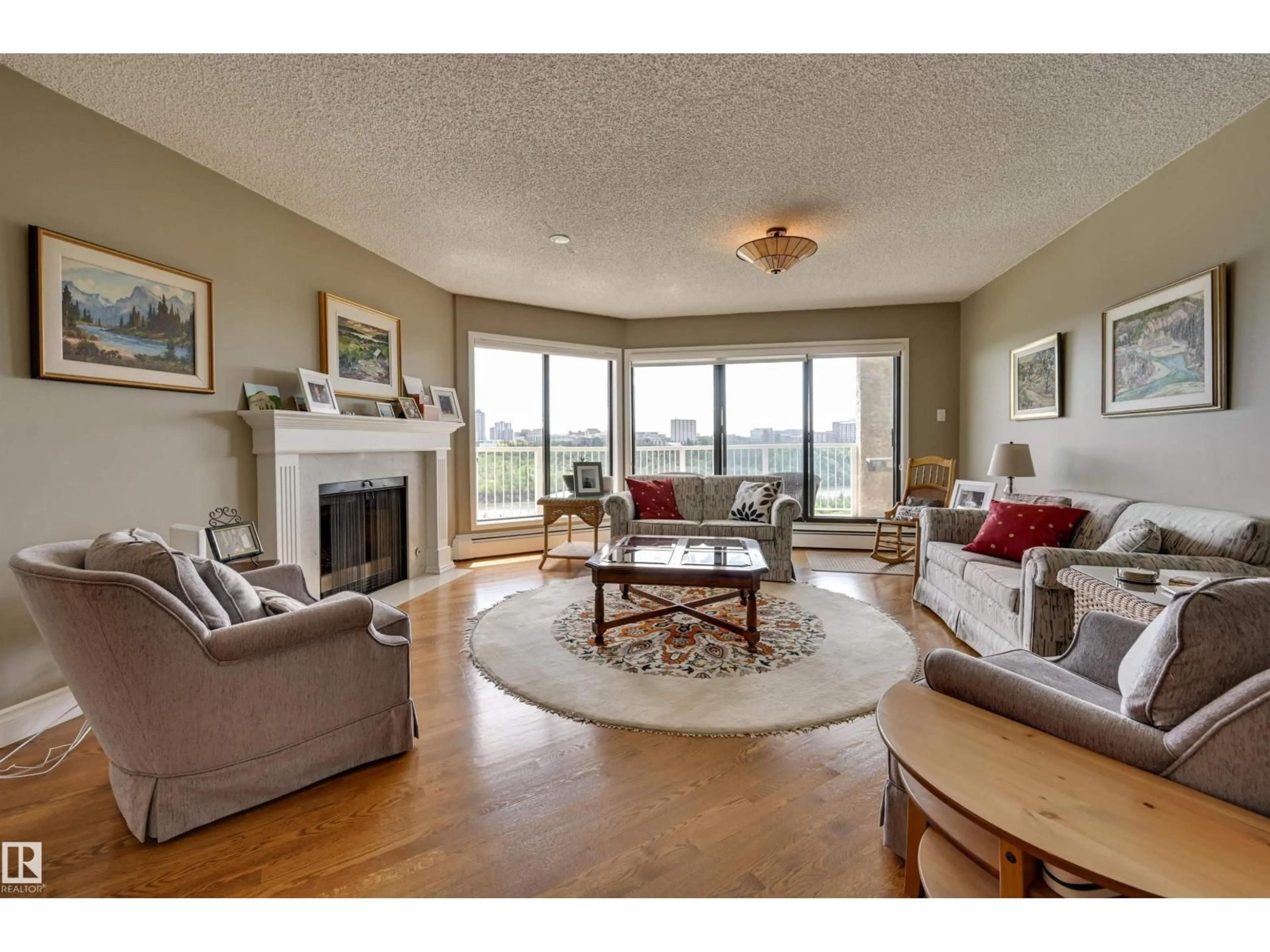 Living room with furniture, wood/laminate floor for #10 - 9734 111 ST, Edmonton Alberta T5K1J8
