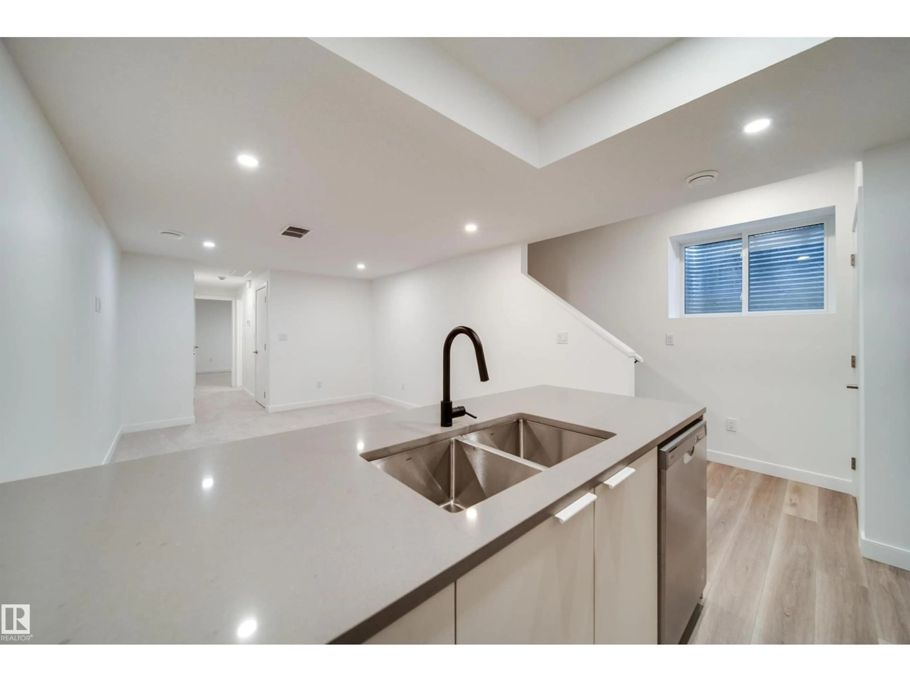 Open concept kitchen, ceramic/tile floor for 8522 80 AV, Edmonton Alberta T6C0W3