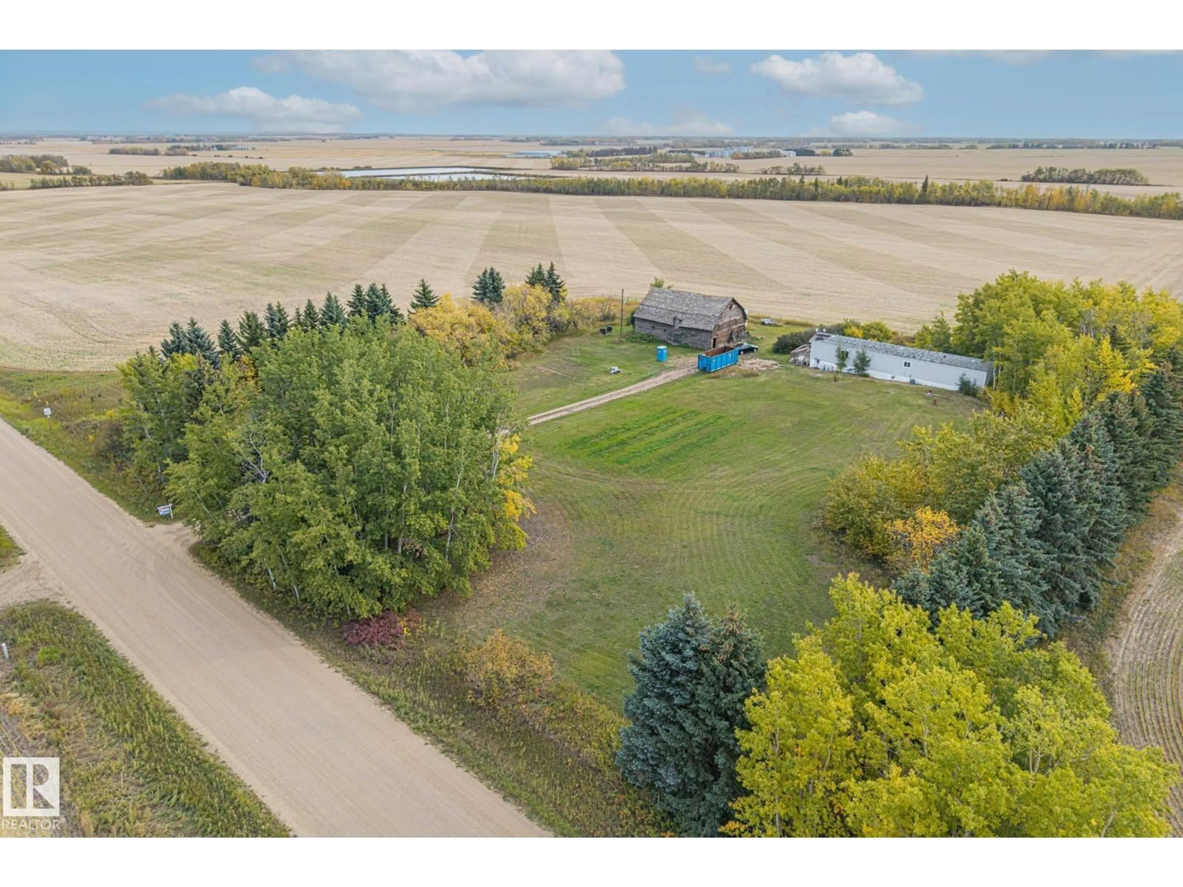 A pic from outside/outdoor area/front of a property/back of a property/a pic from drone, water/lake/river/ocean view for 57417 RGE ROAD 251, Rural Sturgeon County Alberta T0G1L0