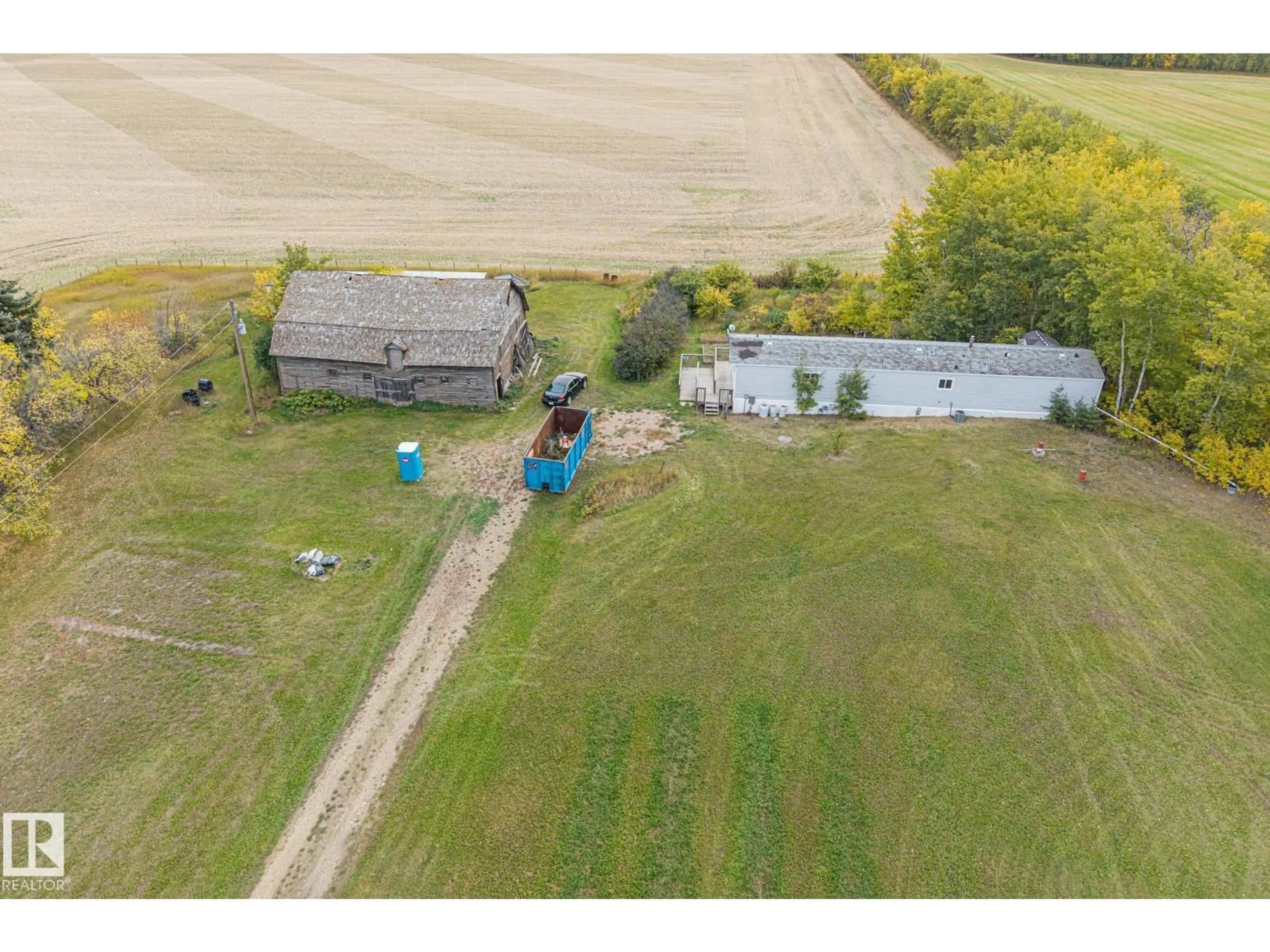 A pic from outside/outdoor area/front of a property/back of a property/a pic from drone, building for 57417 RGE ROAD 251, Rural Sturgeon County Alberta T0G1L0