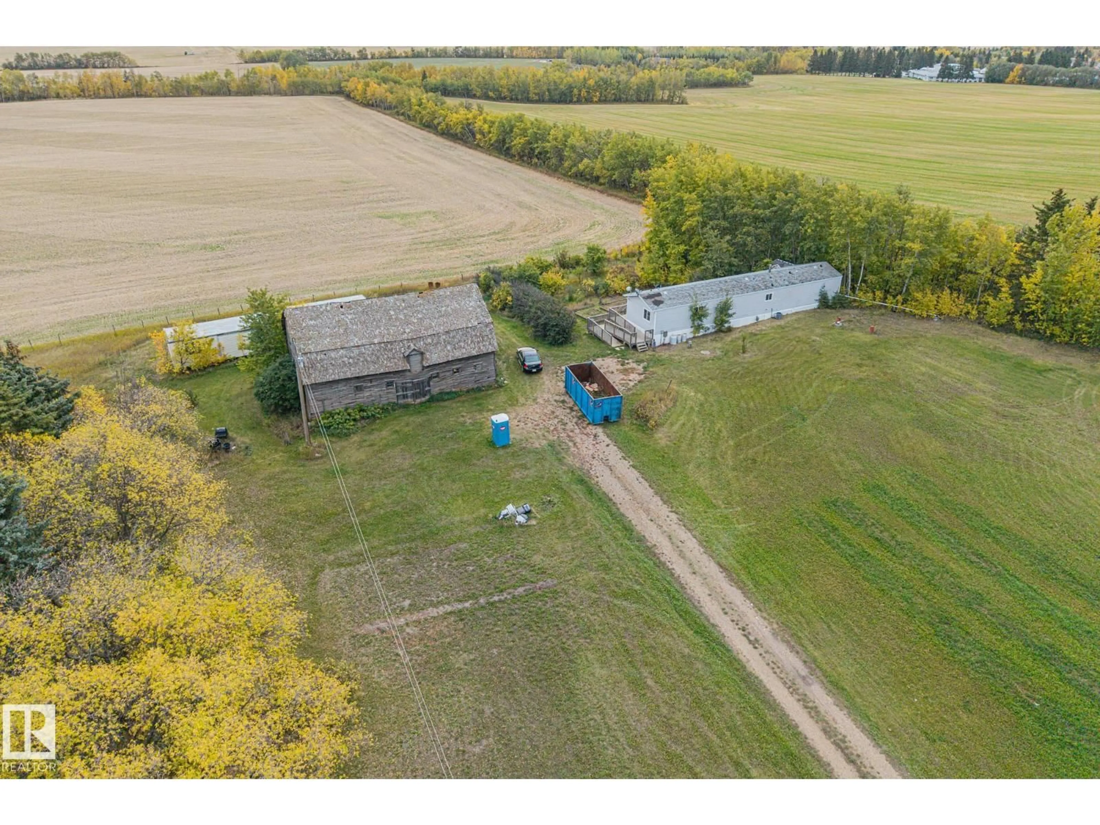 A pic from outside/outdoor area/front of a property/back of a property/a pic from drone, building for 57417 RGE ROAD 251, Rural Sturgeon County Alberta T0G1L0