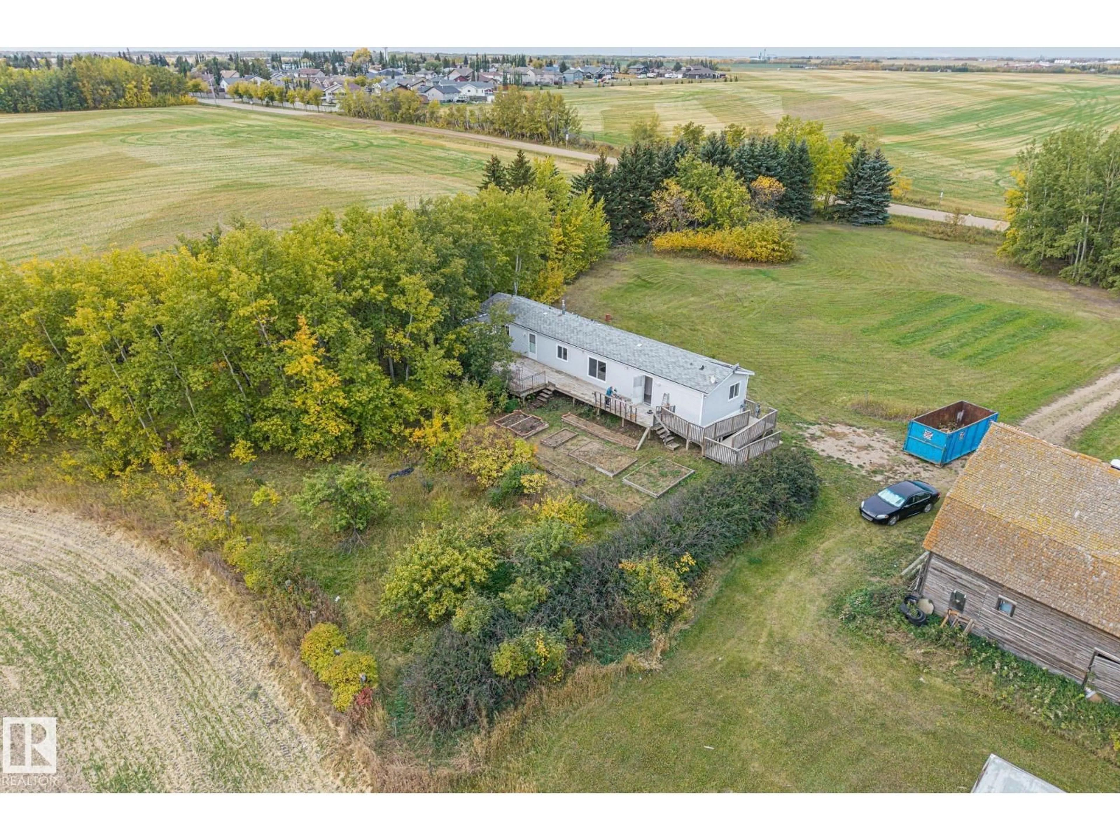 A pic from outside/outdoor area/front of a property/back of a property/a pic from drone, unknown for 57417 RGE ROAD 251, Rural Sturgeon County Alberta T0G1L0