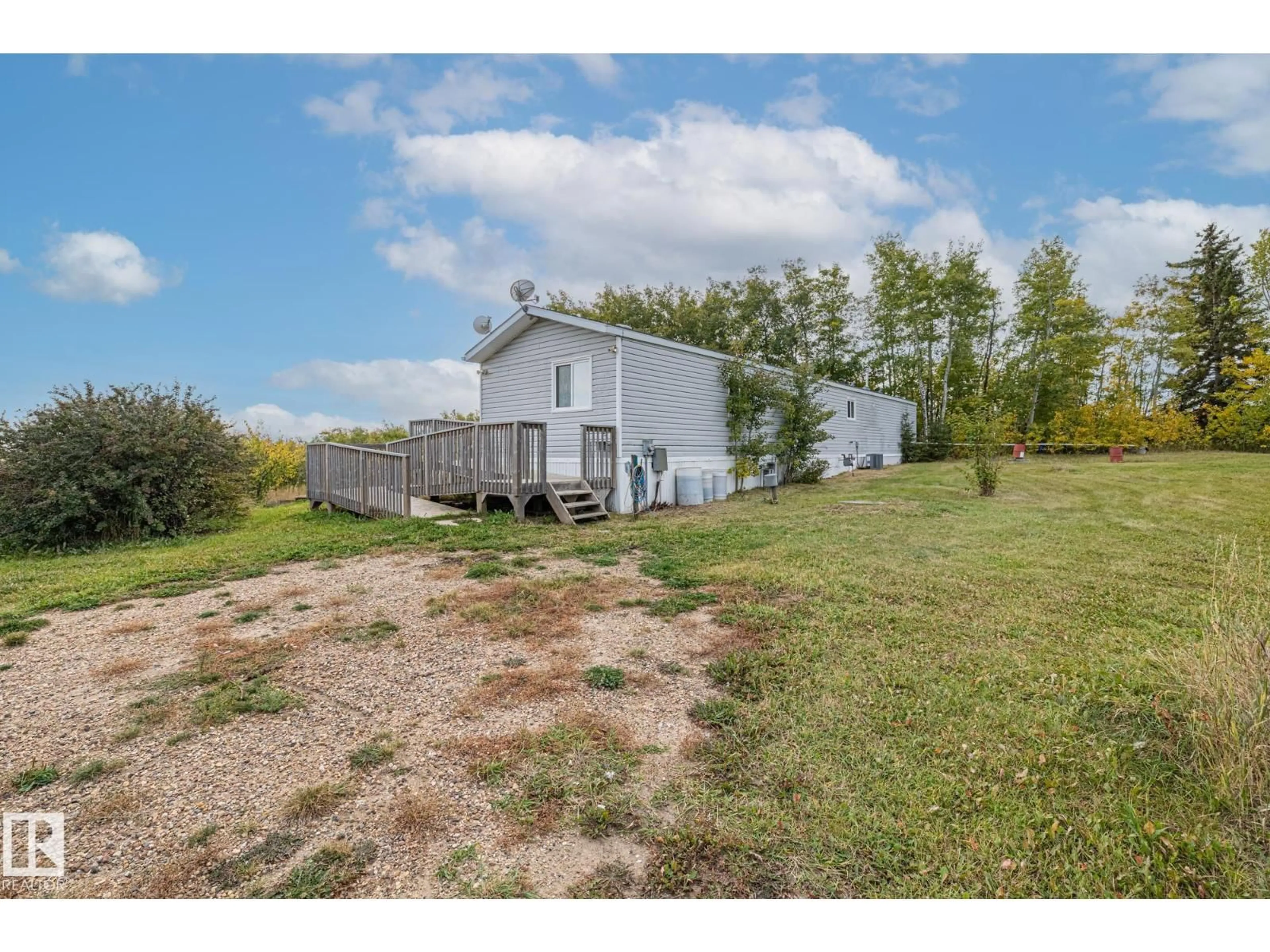 A pic from outside/outdoor area/front of a property/back of a property/a pic from drone, water/lake/river/ocean view for 57417 RGE ROAD 251, Rural Sturgeon County Alberta T0G1L0