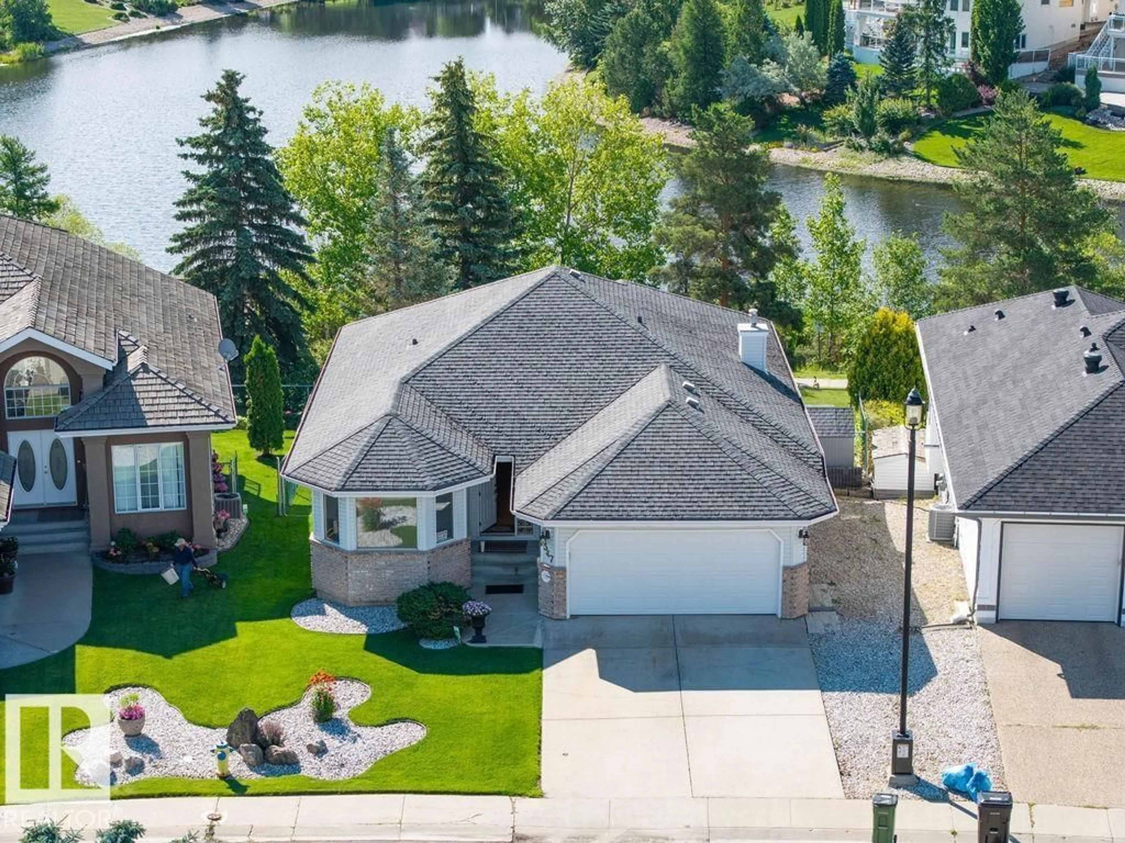 A pic from outside/outdoor area/front of a property/back of a property/a pic from drone, water/lake/river/ocean view for 547 TWIN BROOKS BA, Edmonton Alberta T6J6X3