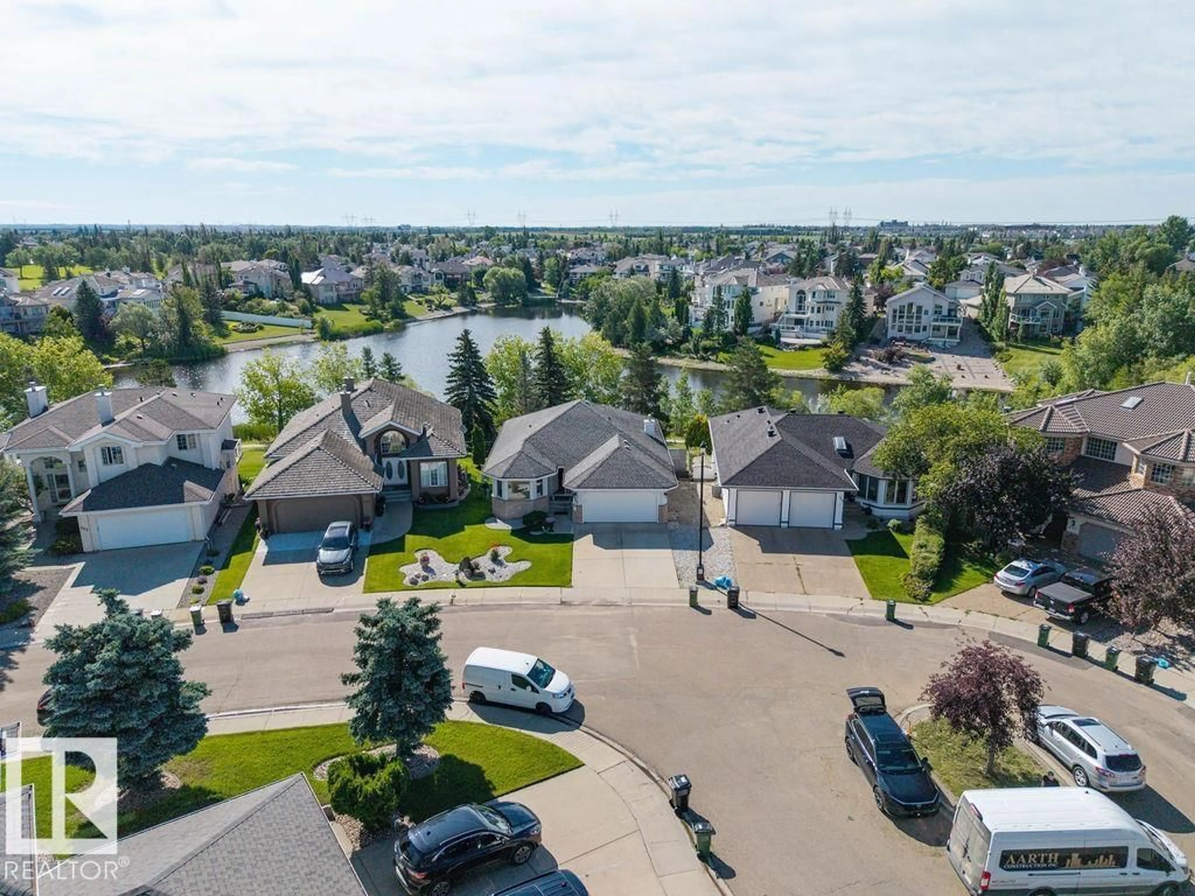 A pic from outside/outdoor area/front of a property/back of a property/a pic from drone, water/lake/river/ocean view for 547 TWIN BROOKS BA, Edmonton Alberta T6J6X3