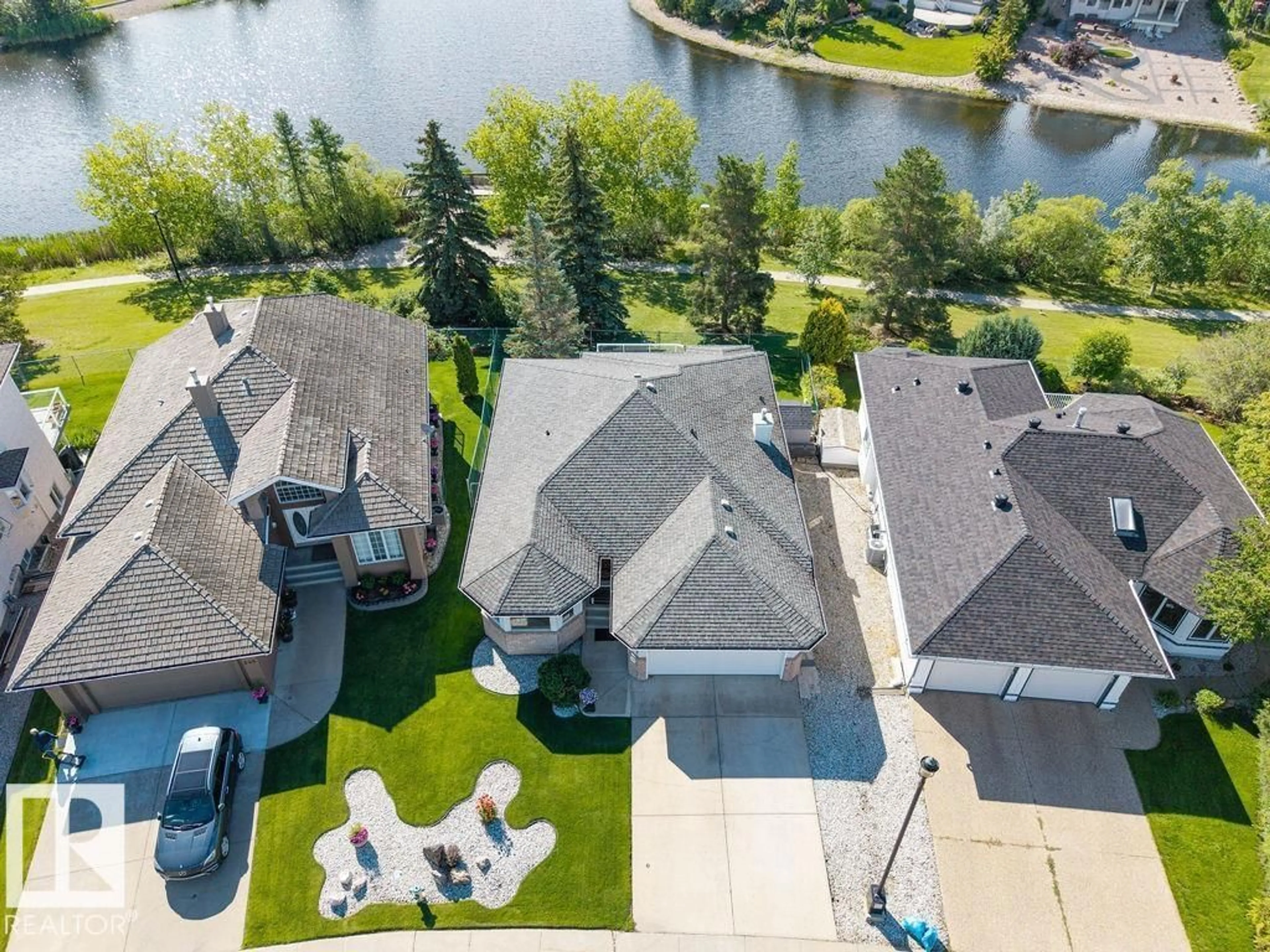 A pic from outside/outdoor area/front of a property/back of a property/a pic from drone, water/lake/river/ocean view for 547 TWIN BROOKS BA, Edmonton Alberta T6J6X3