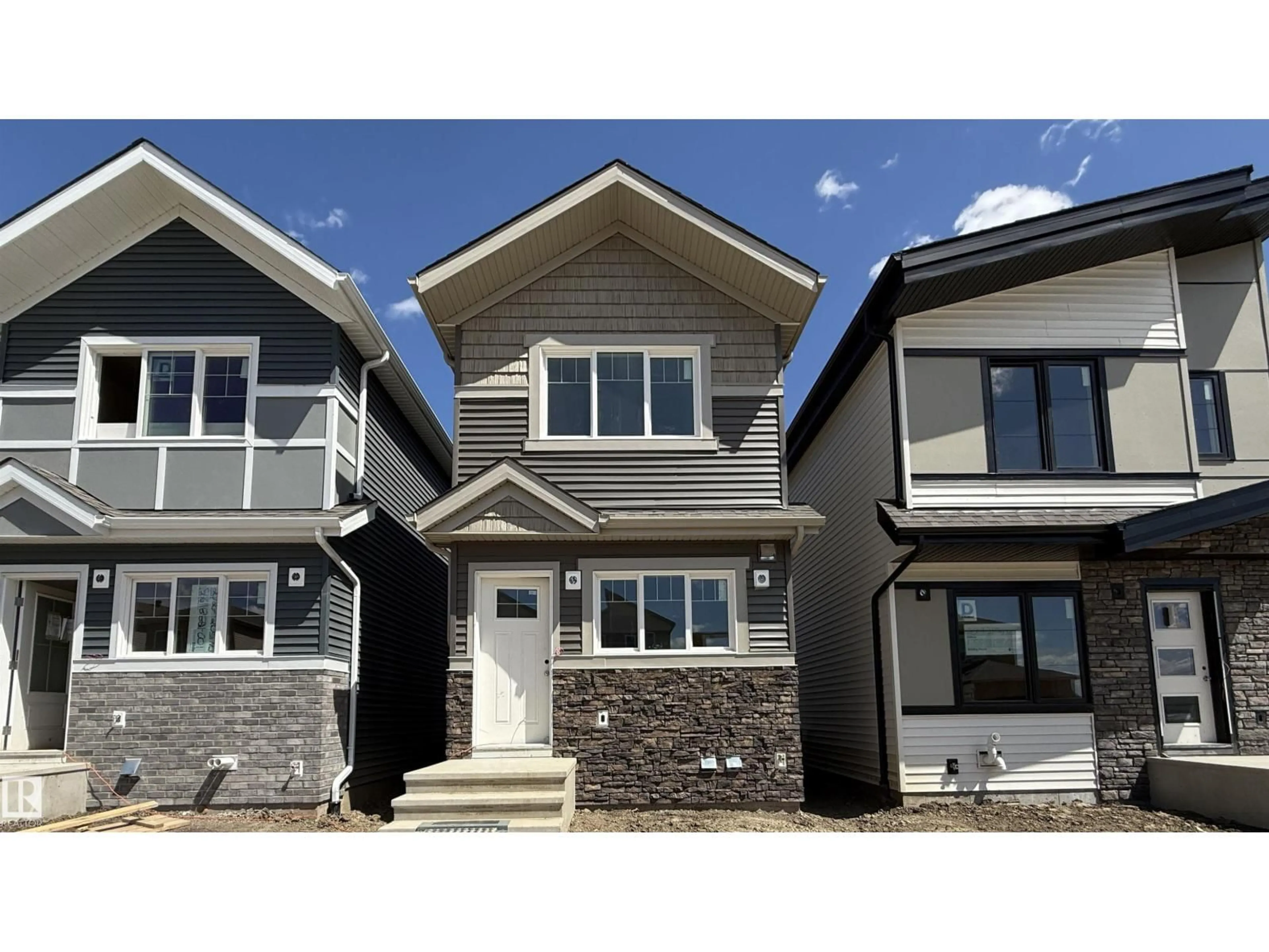 Home with vinyl exterior material, street for 2023 210 ST, Edmonton Alberta T6M2P5
